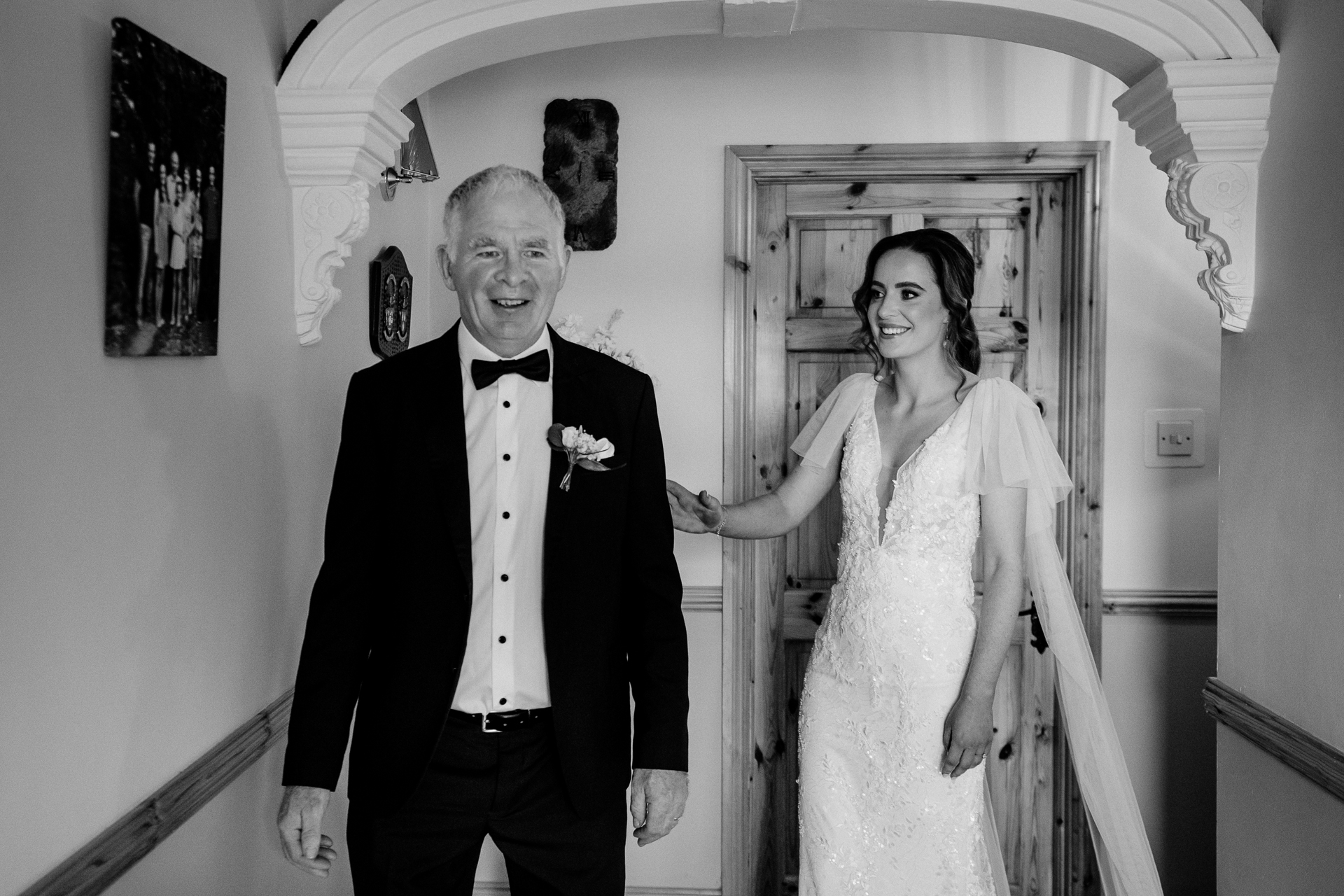 A bride and groom posing for a picture