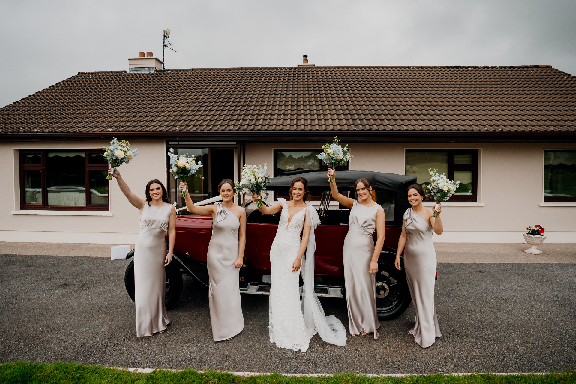 A group of women in white dresses