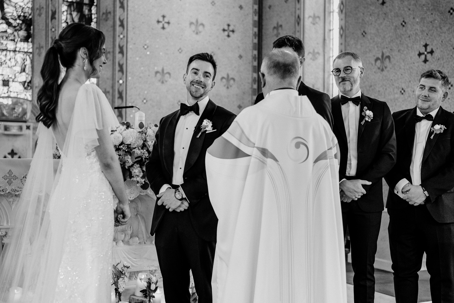 A bride and groom walking down the aisle