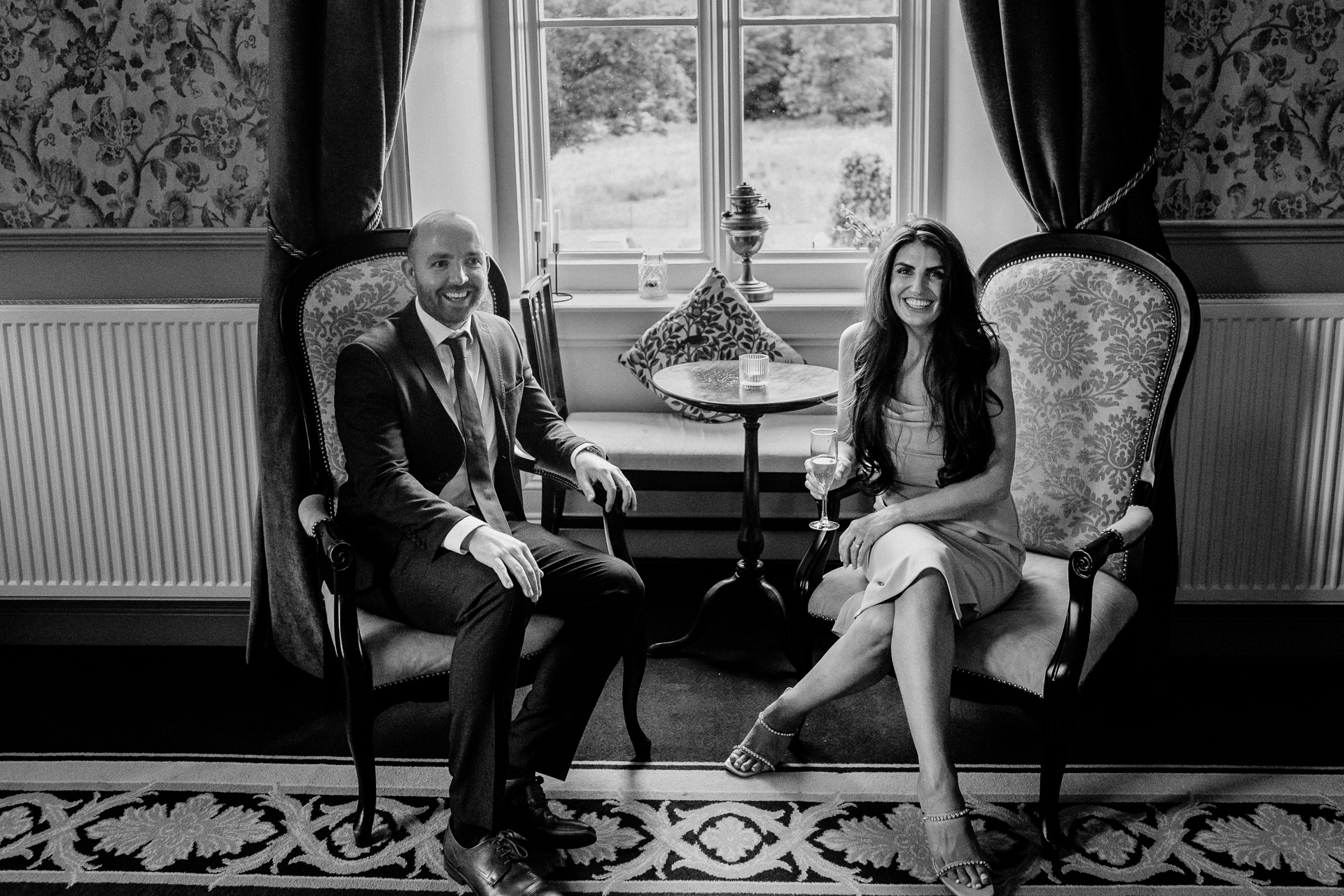 A man and woman sitting in chairs