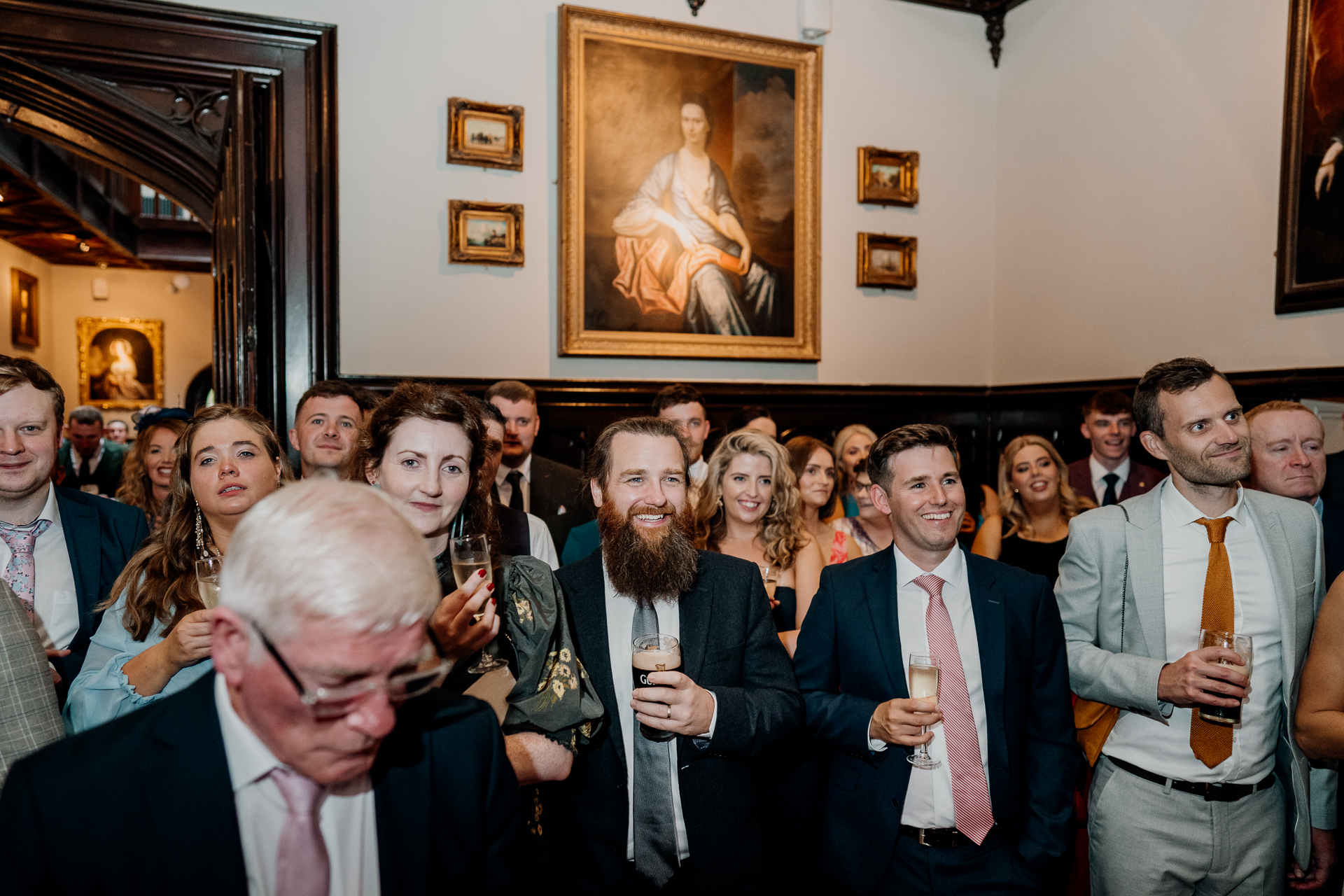 A group of people standing in a room