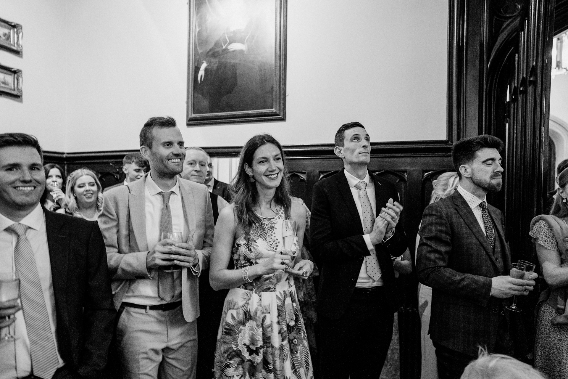 A group of people standing in a room