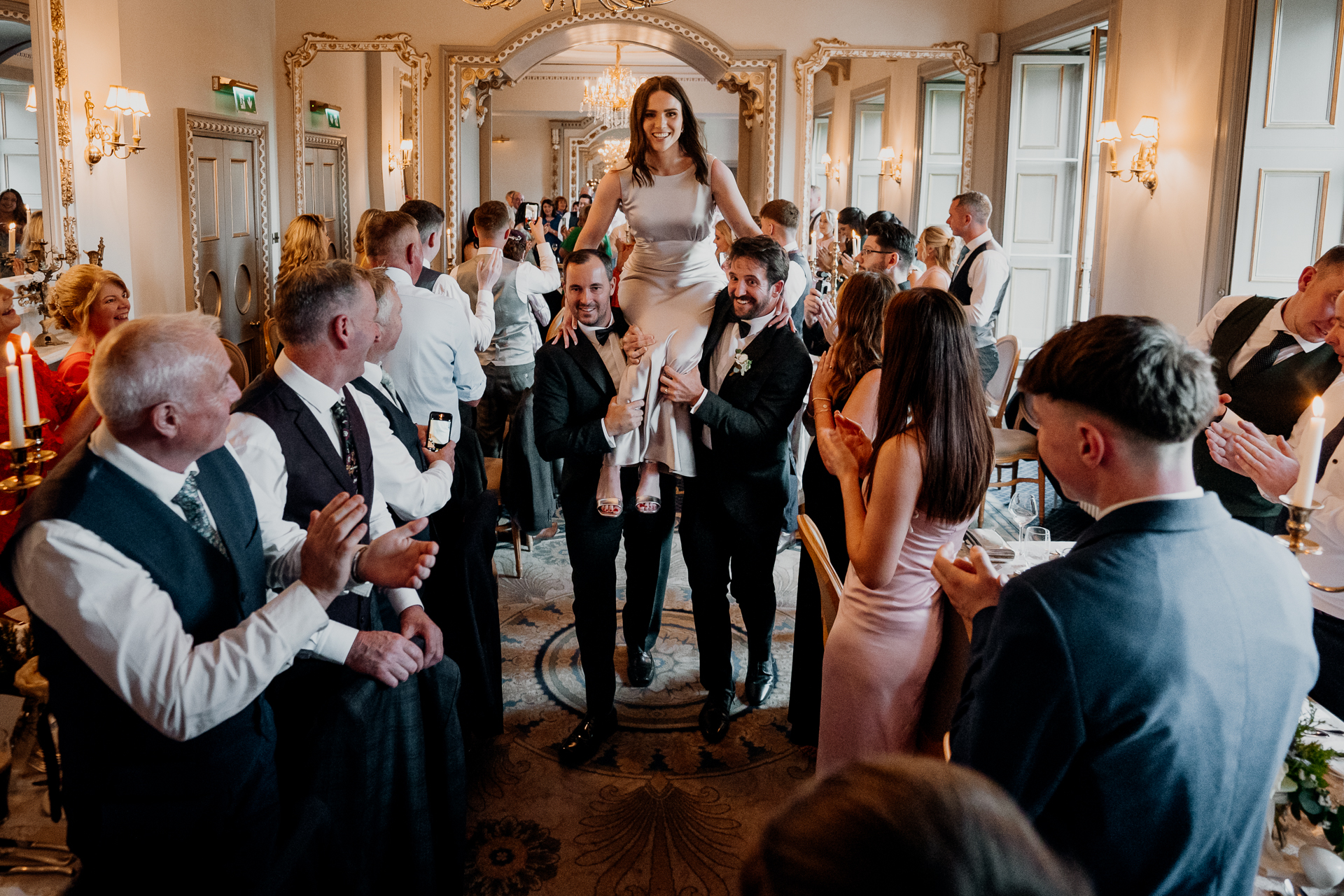 A group of people dancing in a room