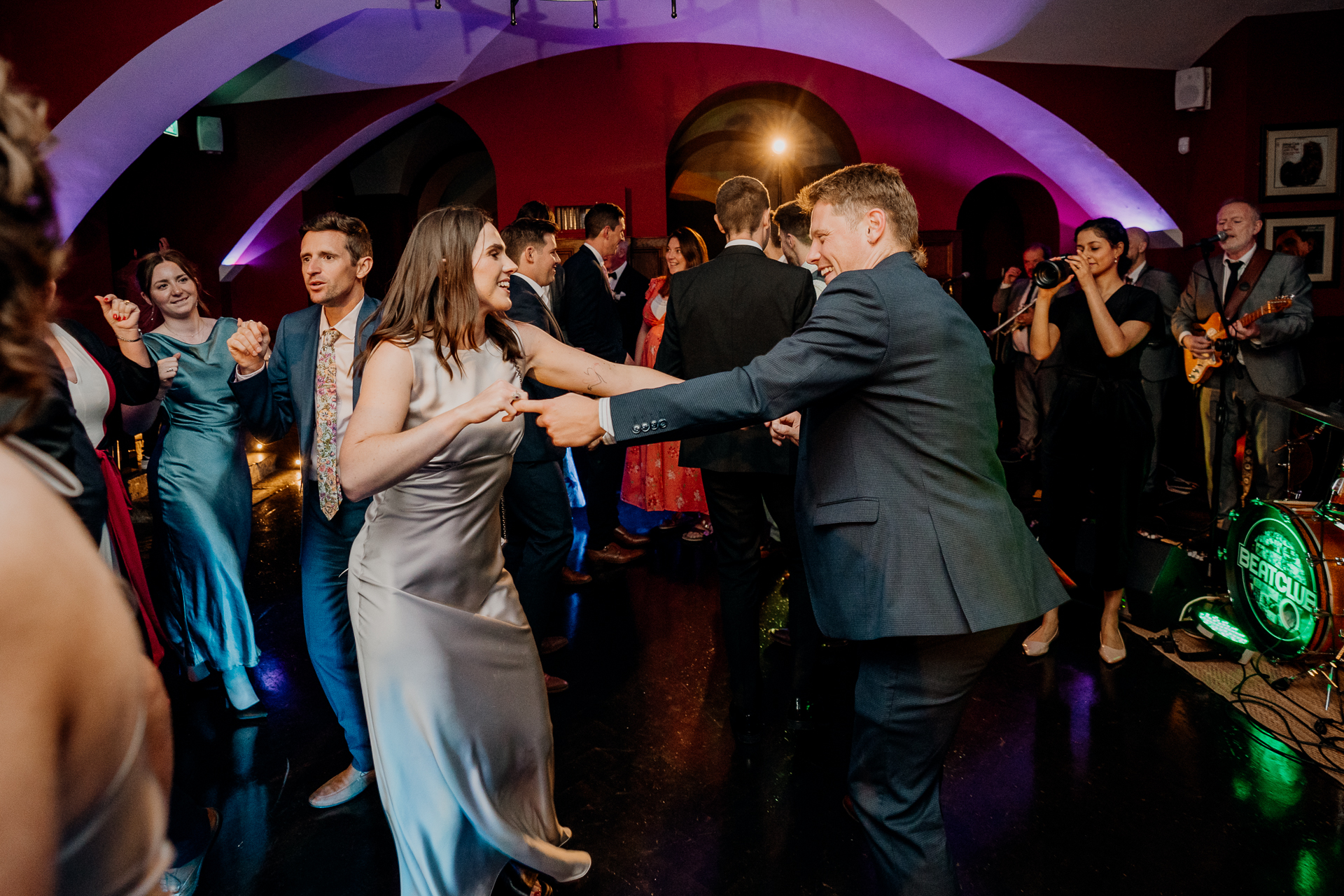 A man and woman dancing in a club