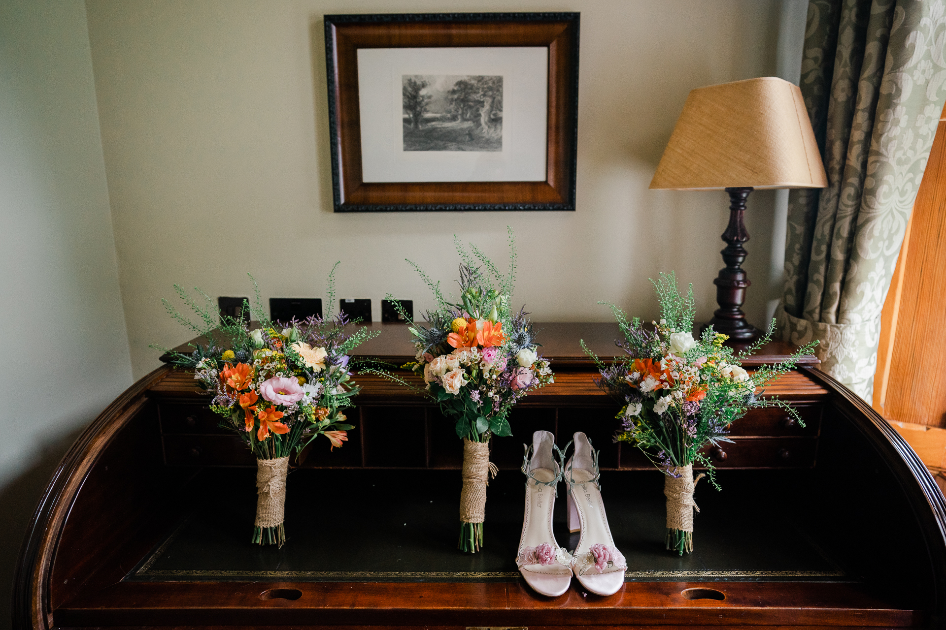 A table with flowers and candles