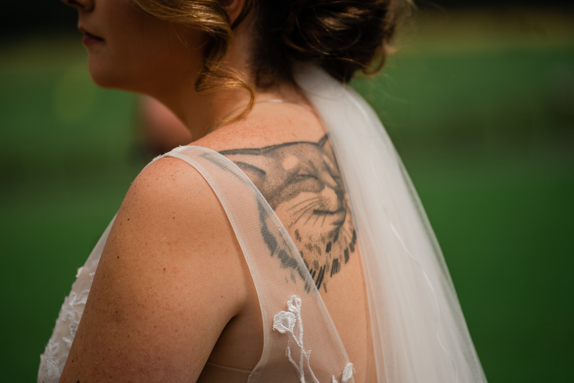 A woman with a tattoo on her back