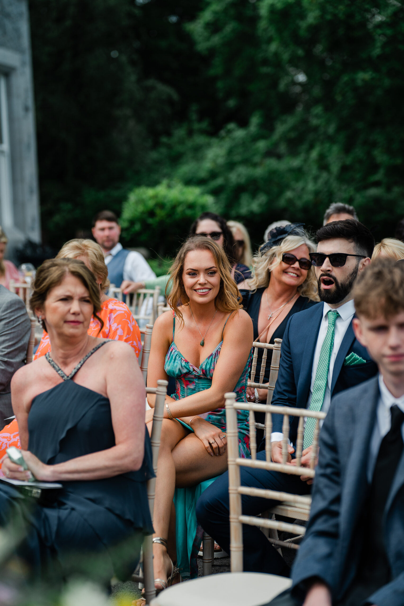 A group of people sitting on a bench