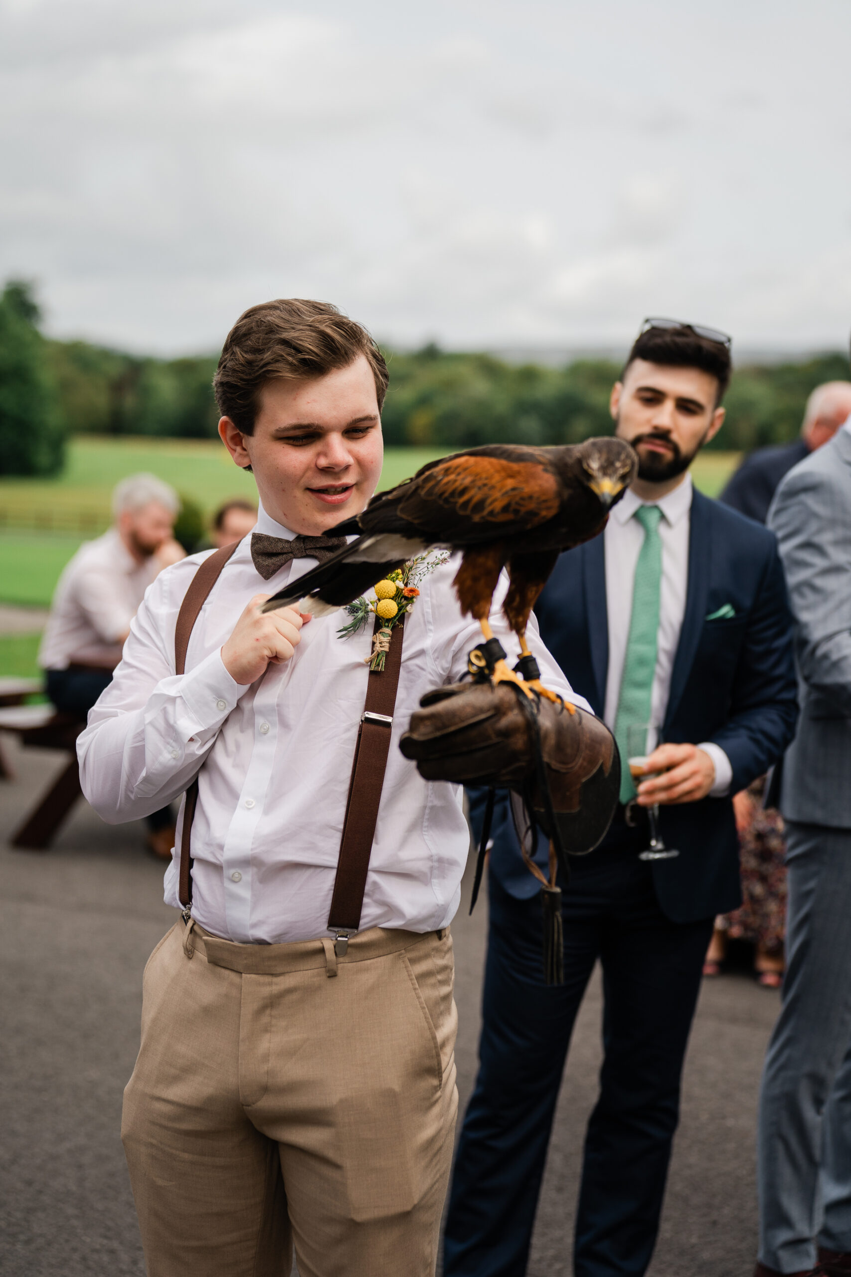 A boy holding a bird