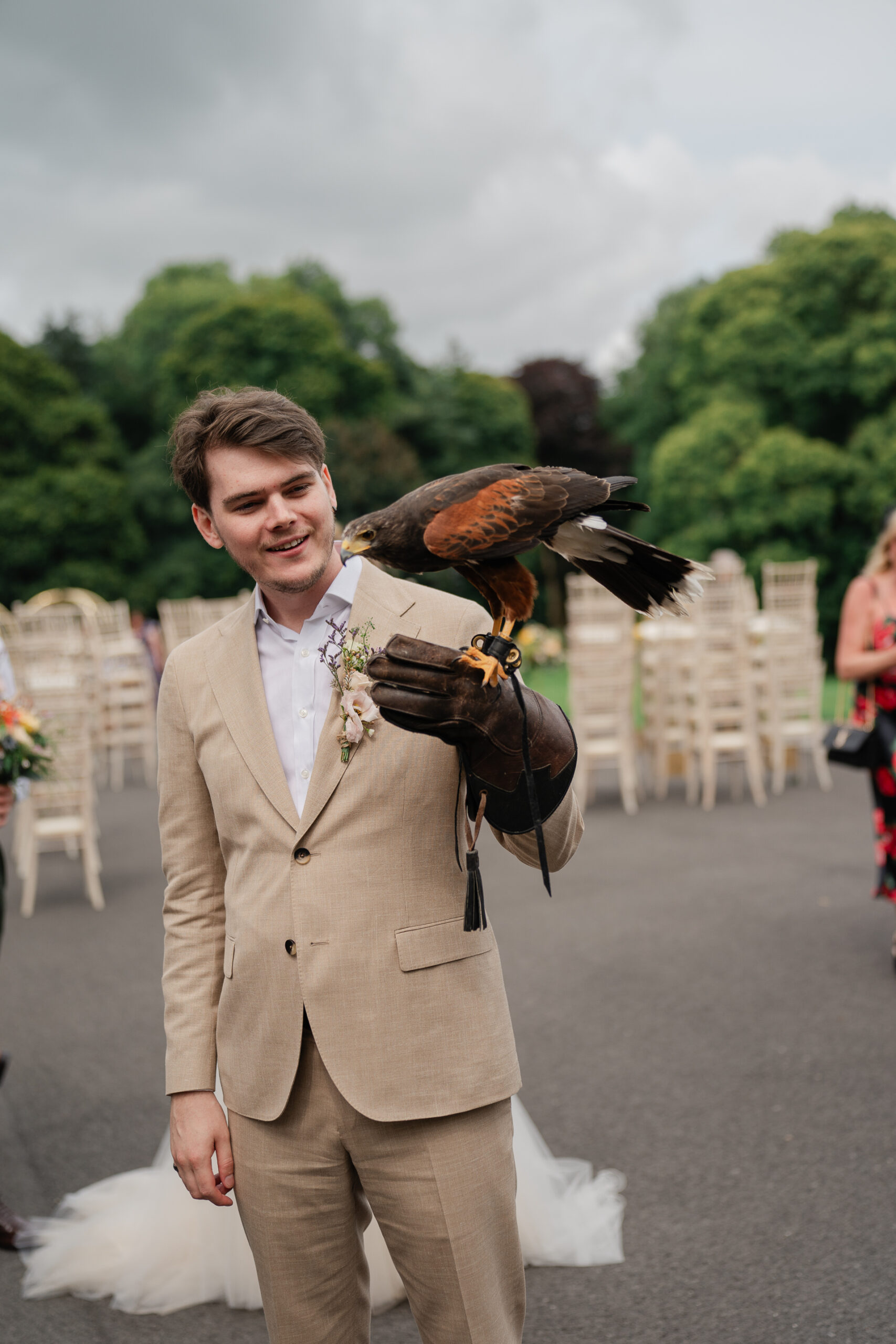 A man holding a bird