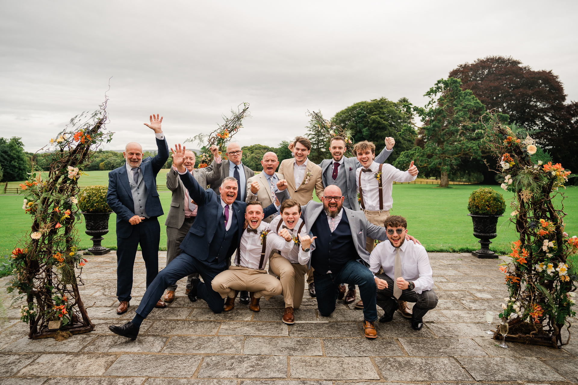 A group of men posing for a photo