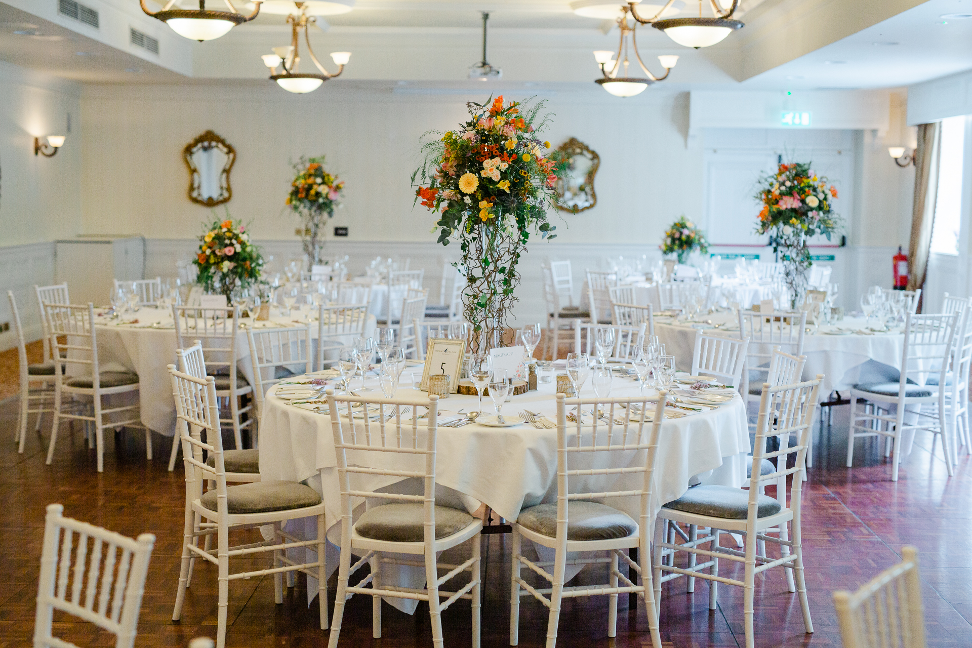 A dining room with tables and chairs