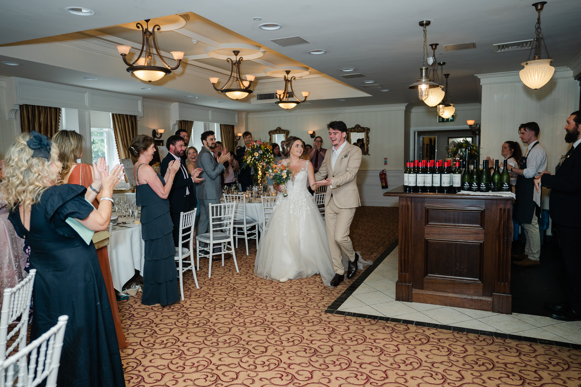 A bride and groom walking down the aisle