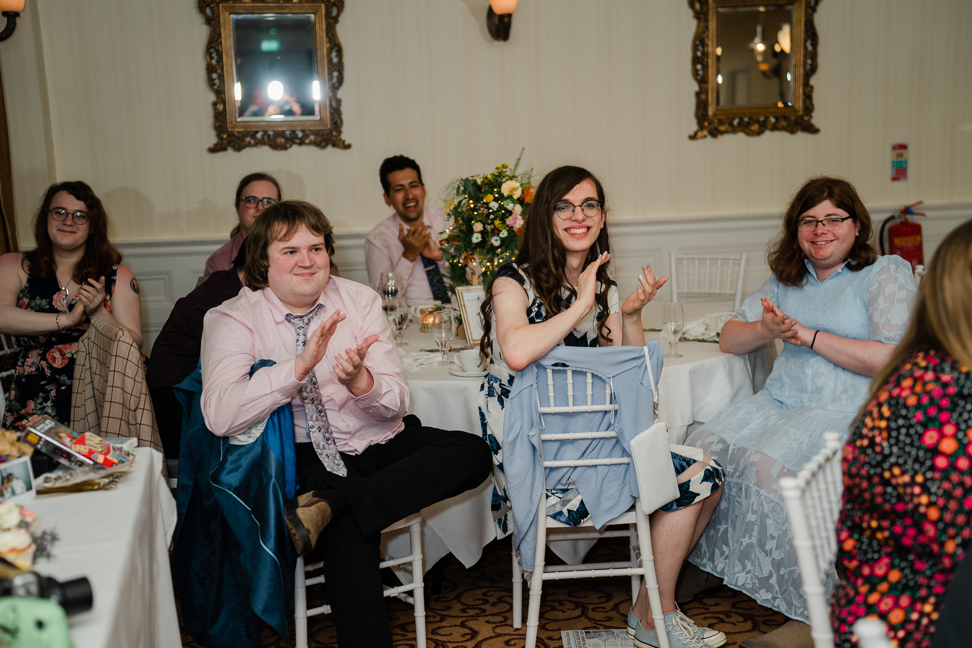 A group of people sitting in chairs