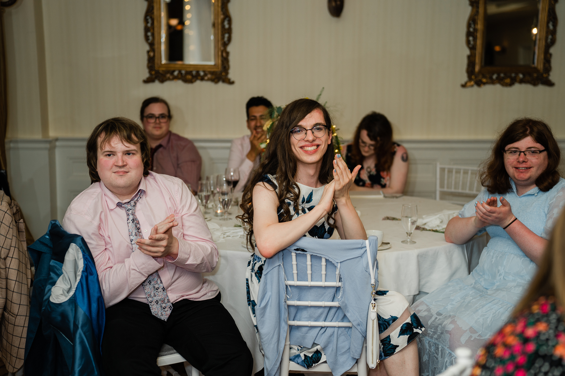 A group of people sitting at a table