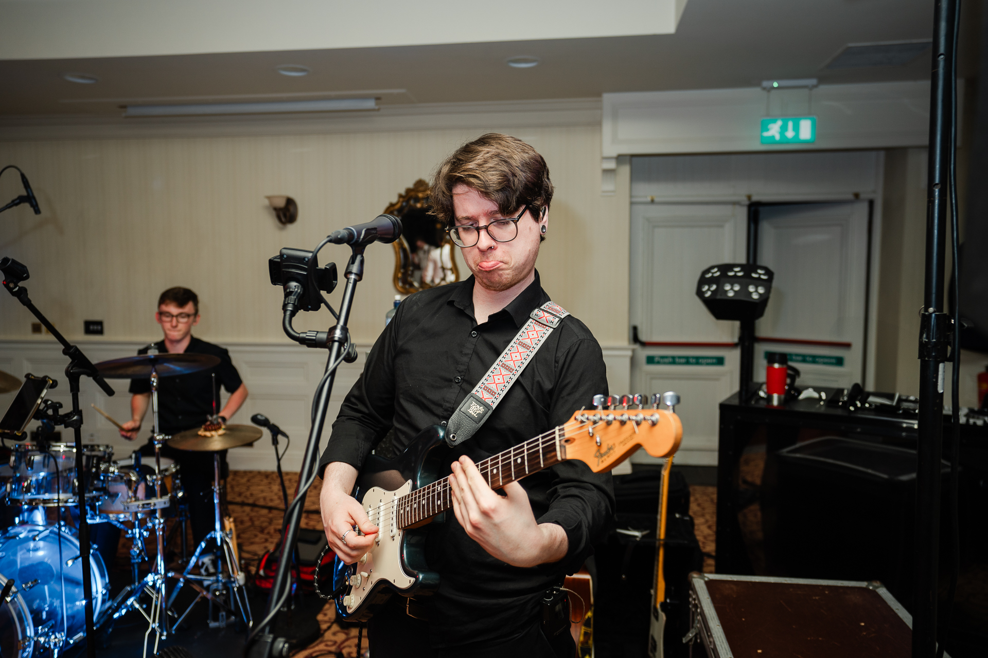 A man playing a guitar