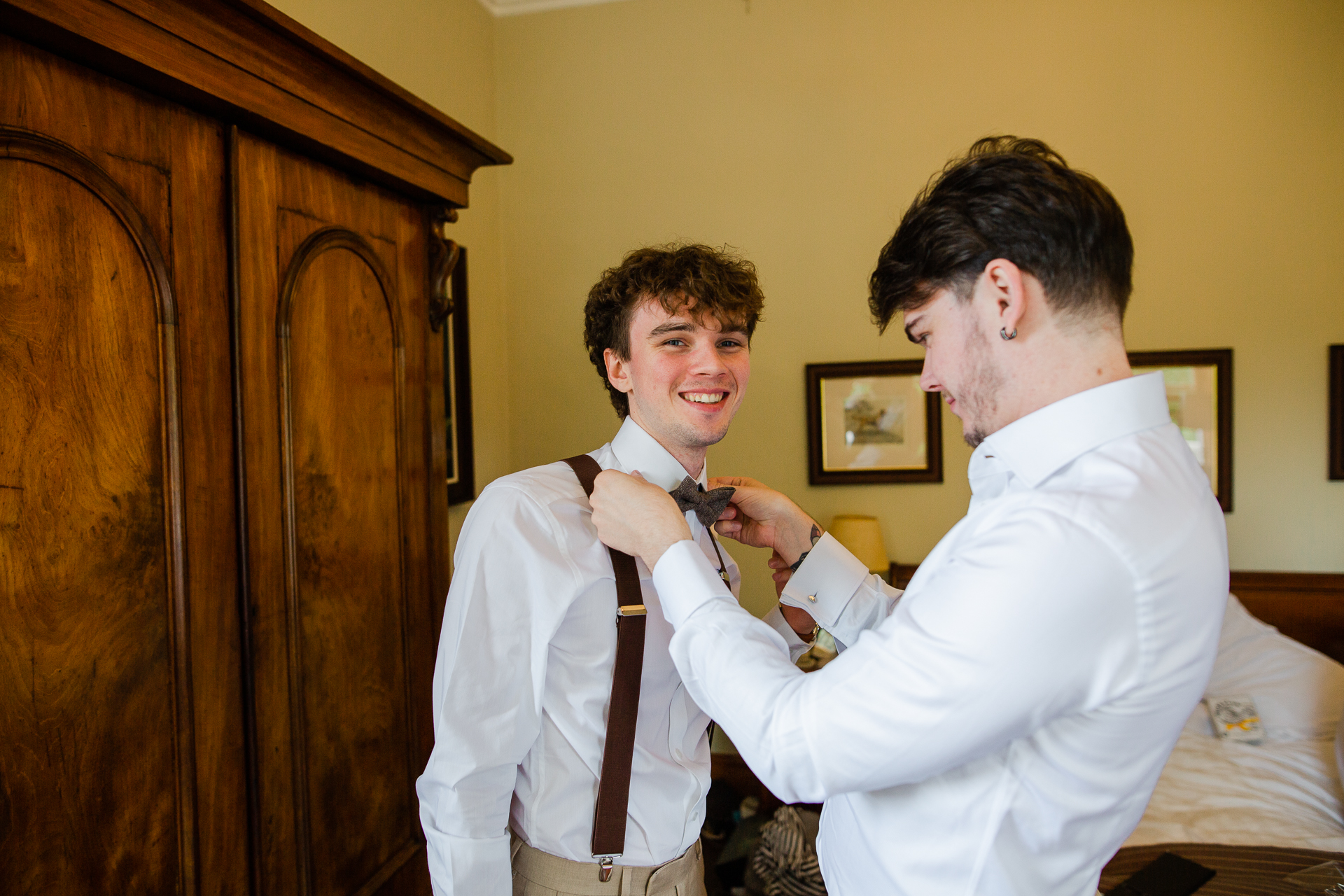 A man tying a tie