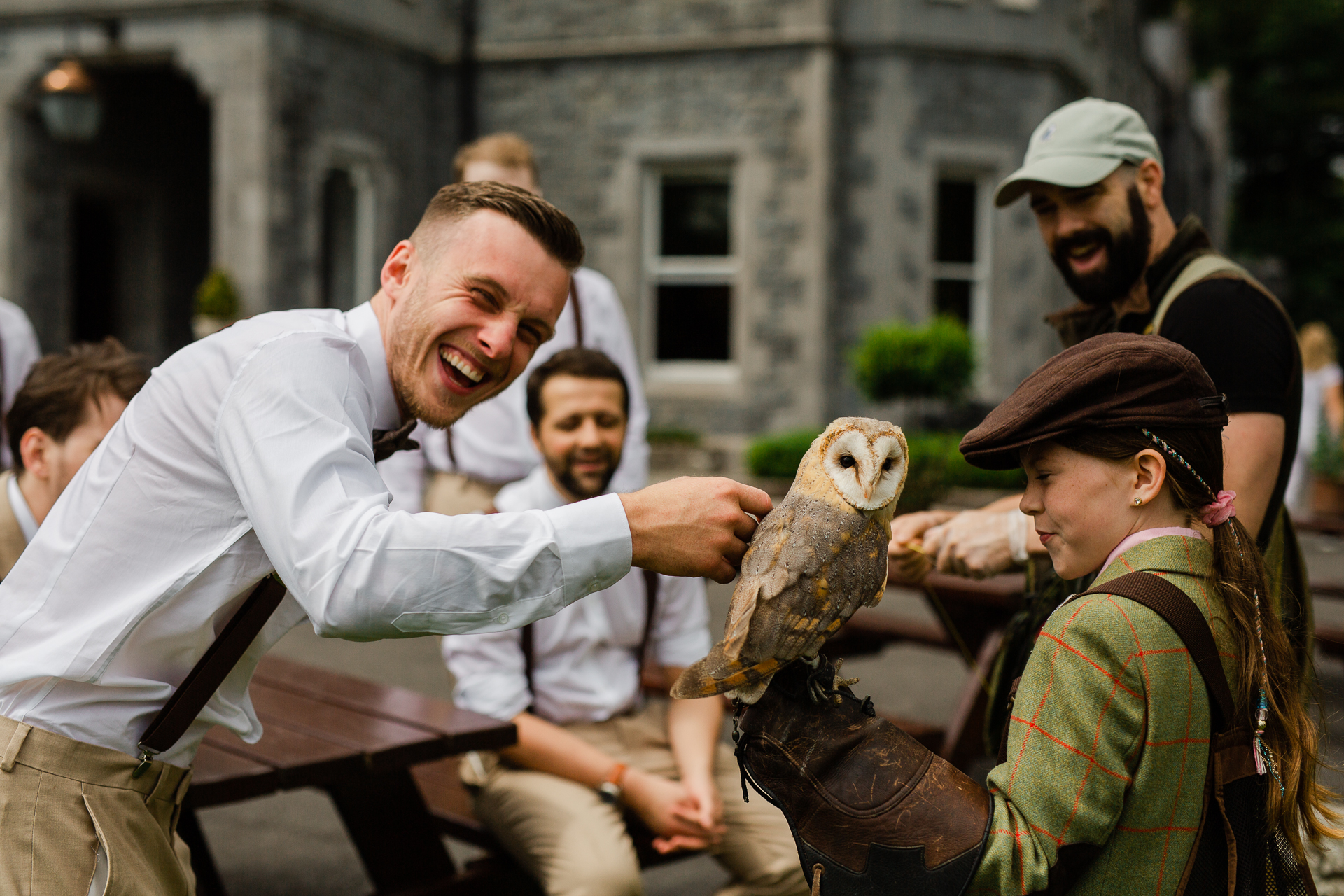 A person holding a bird