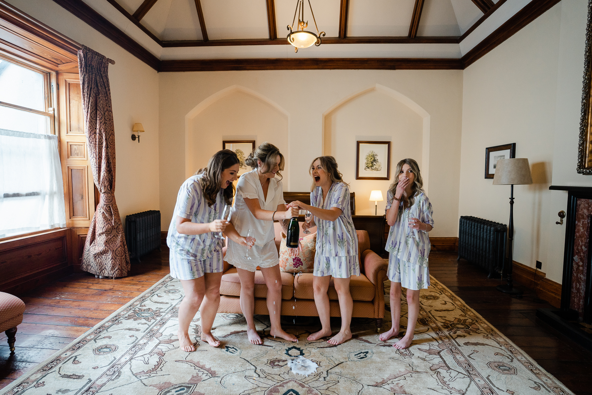 A group of women standing in a living room