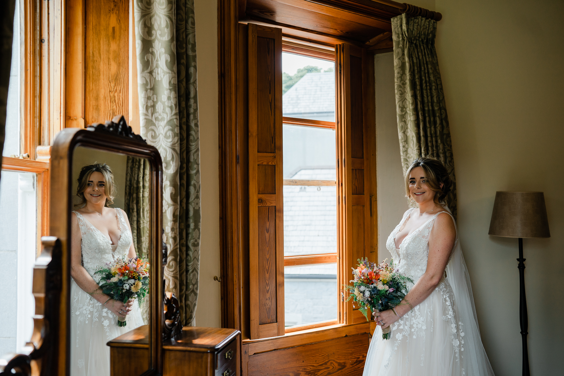 A person in a wedding dress and a person in a white dress