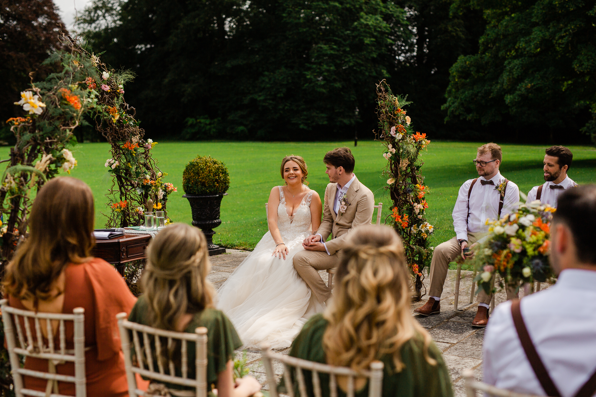 A bride and groom walking down the aisle