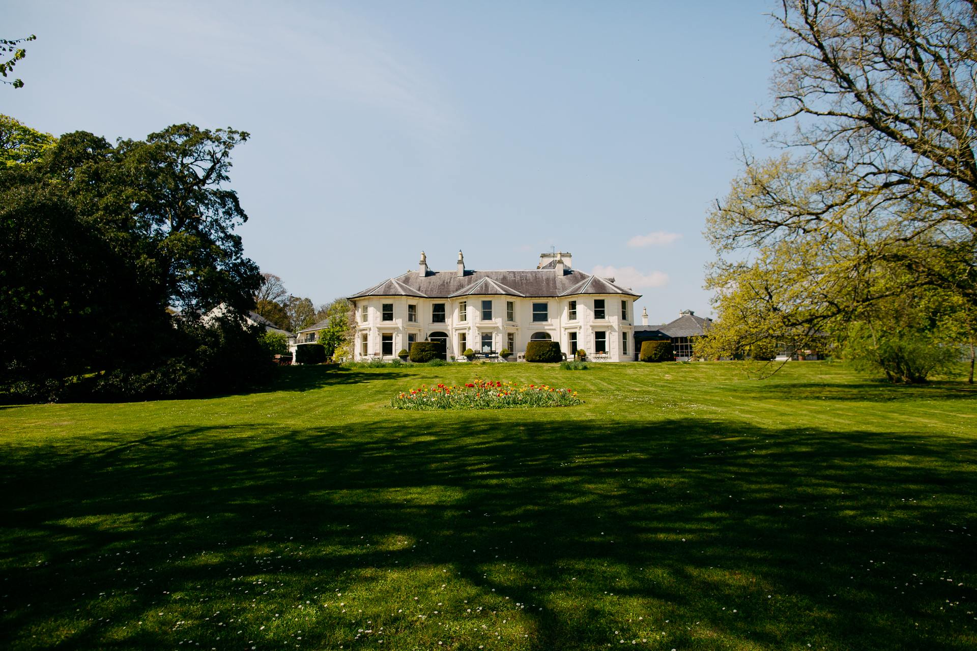 A large house with a large lawn