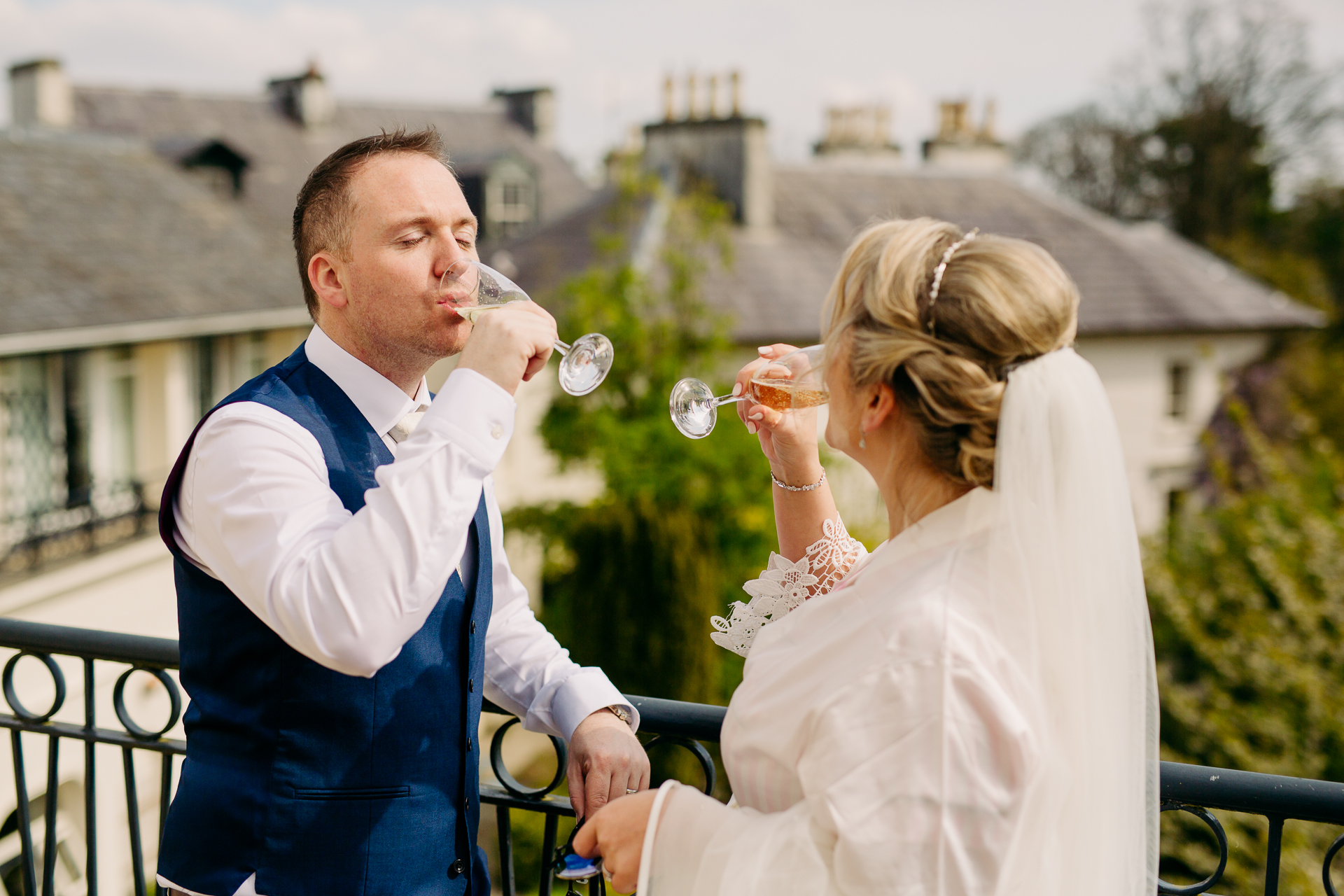 A man and woman drinking wine