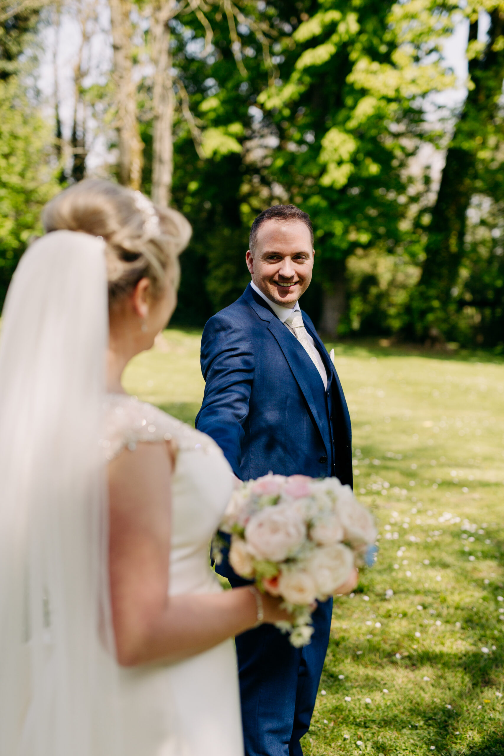 A man and woman holding flowers