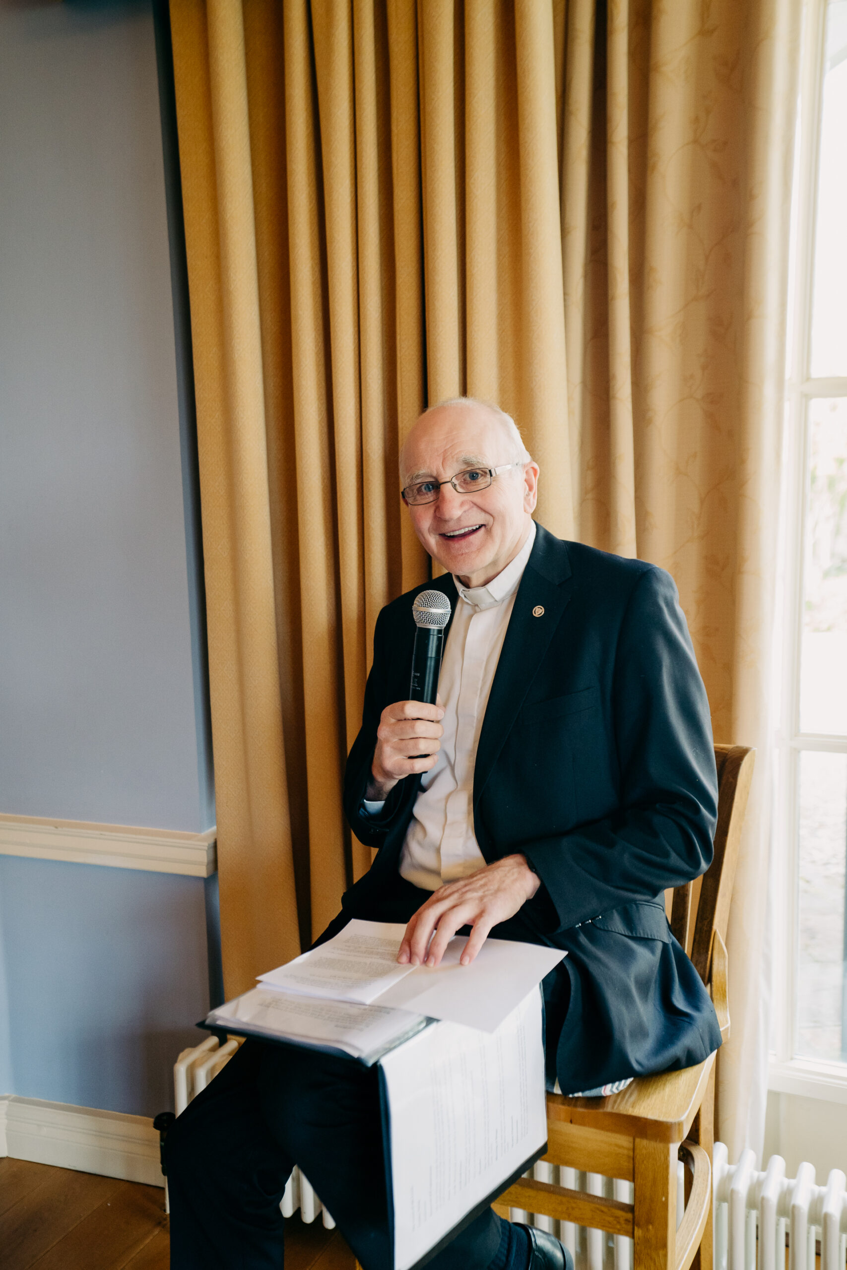 A person sitting at a podium