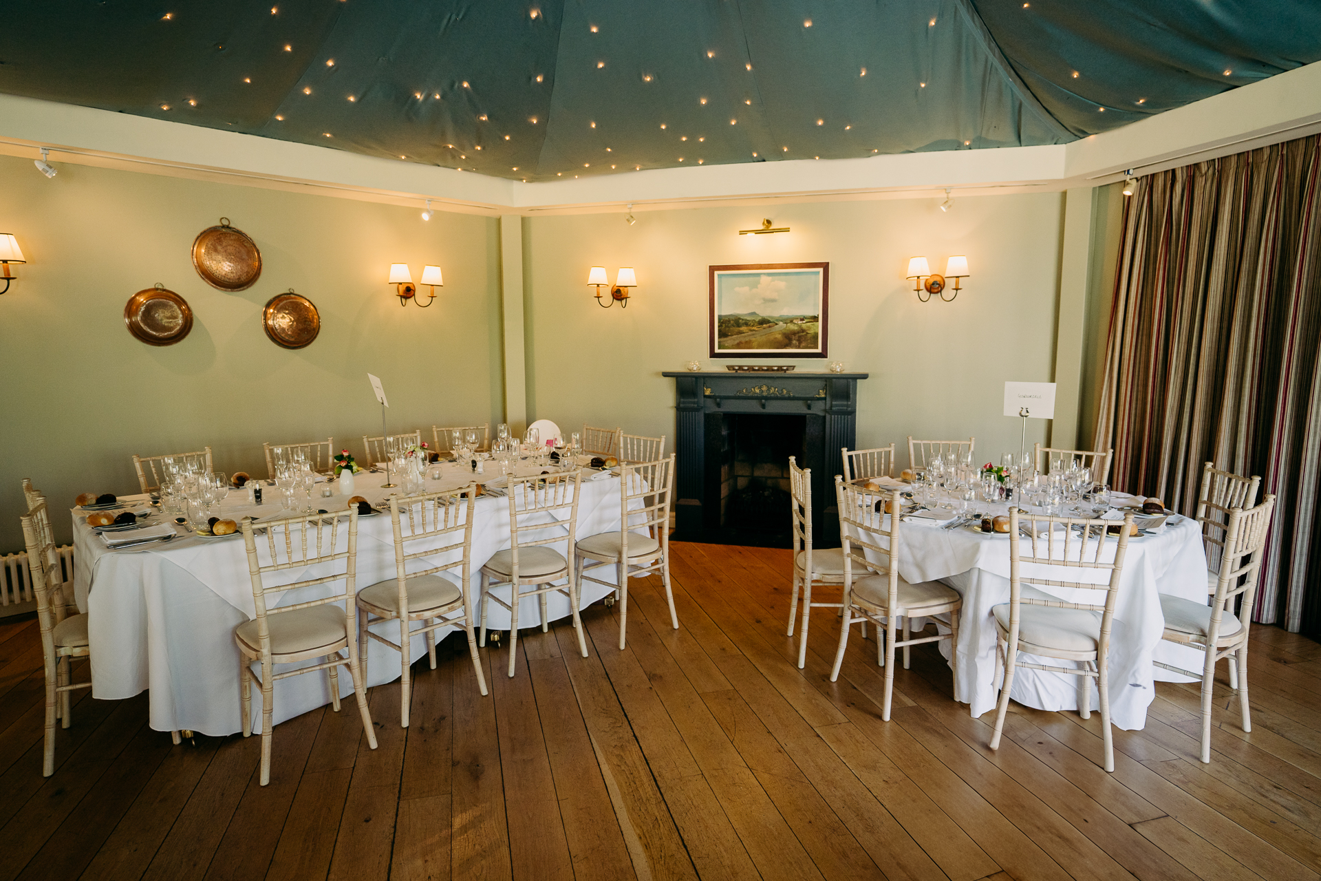 A dining room with a fireplace