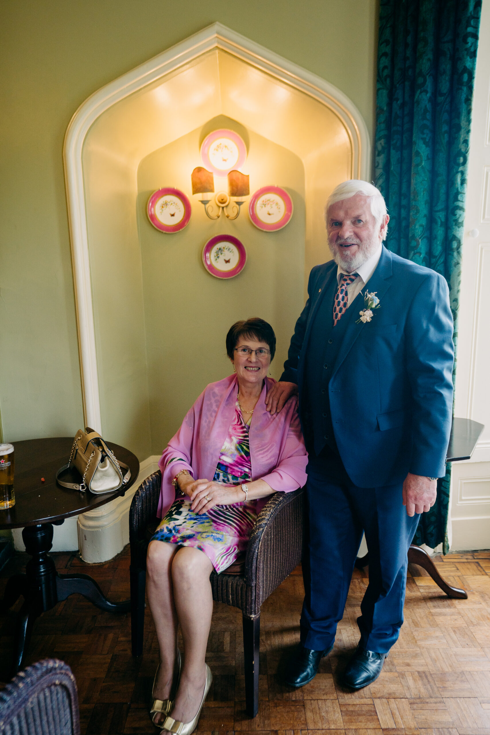 A man and woman posing for a picture