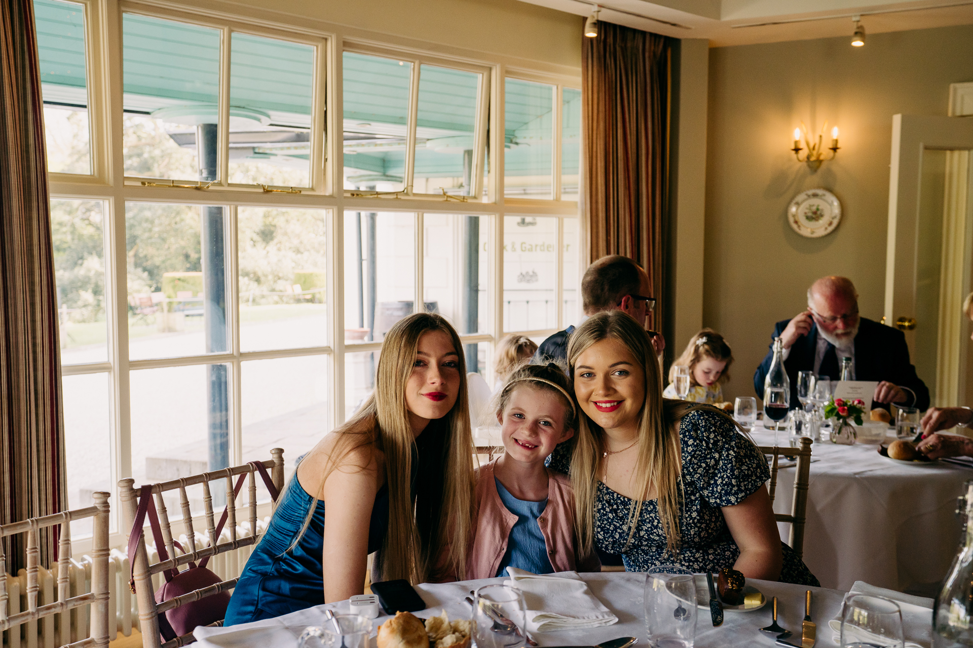 A group of people sitting at a table