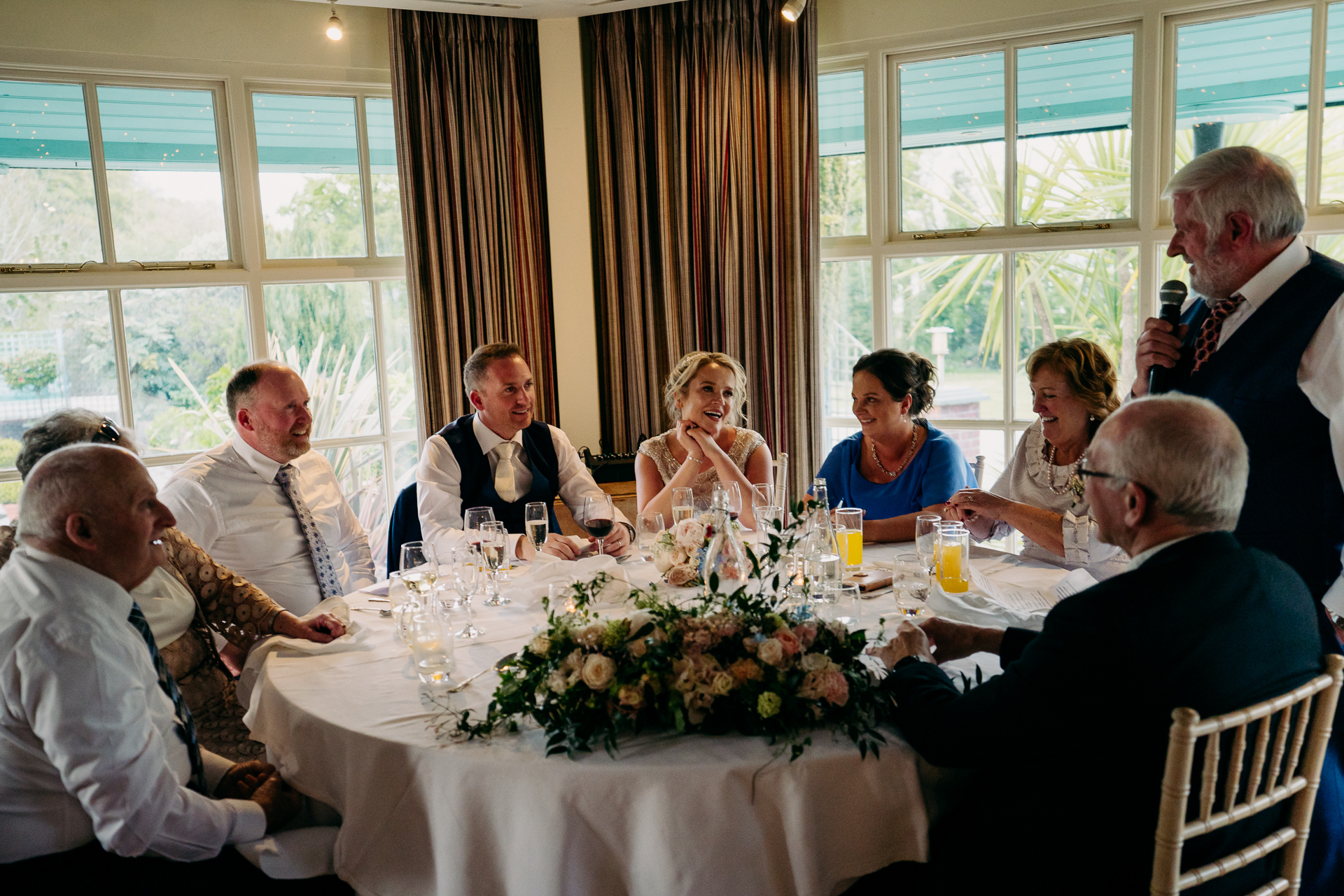 A group of people sitting around a table