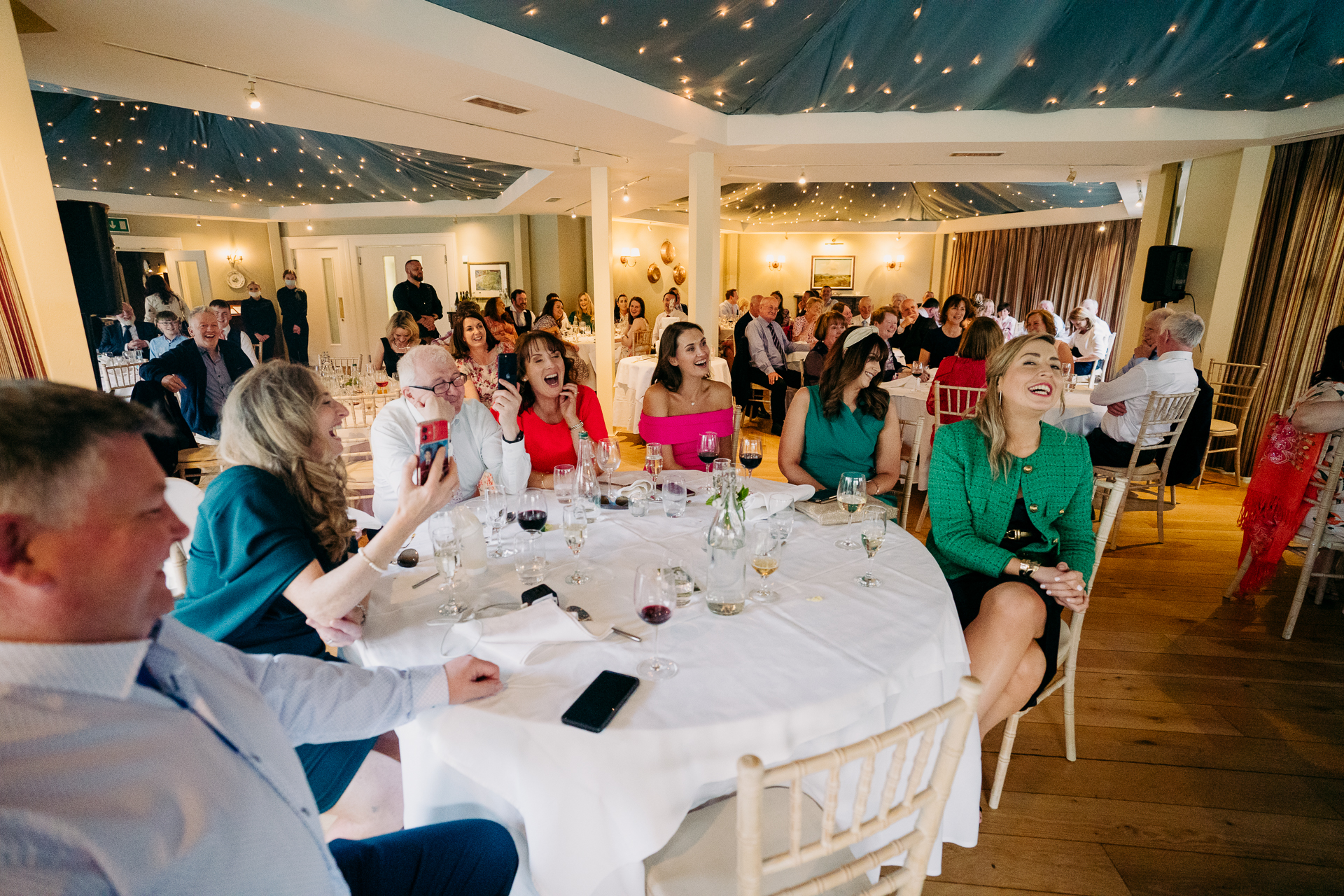 A group of people sitting at a table