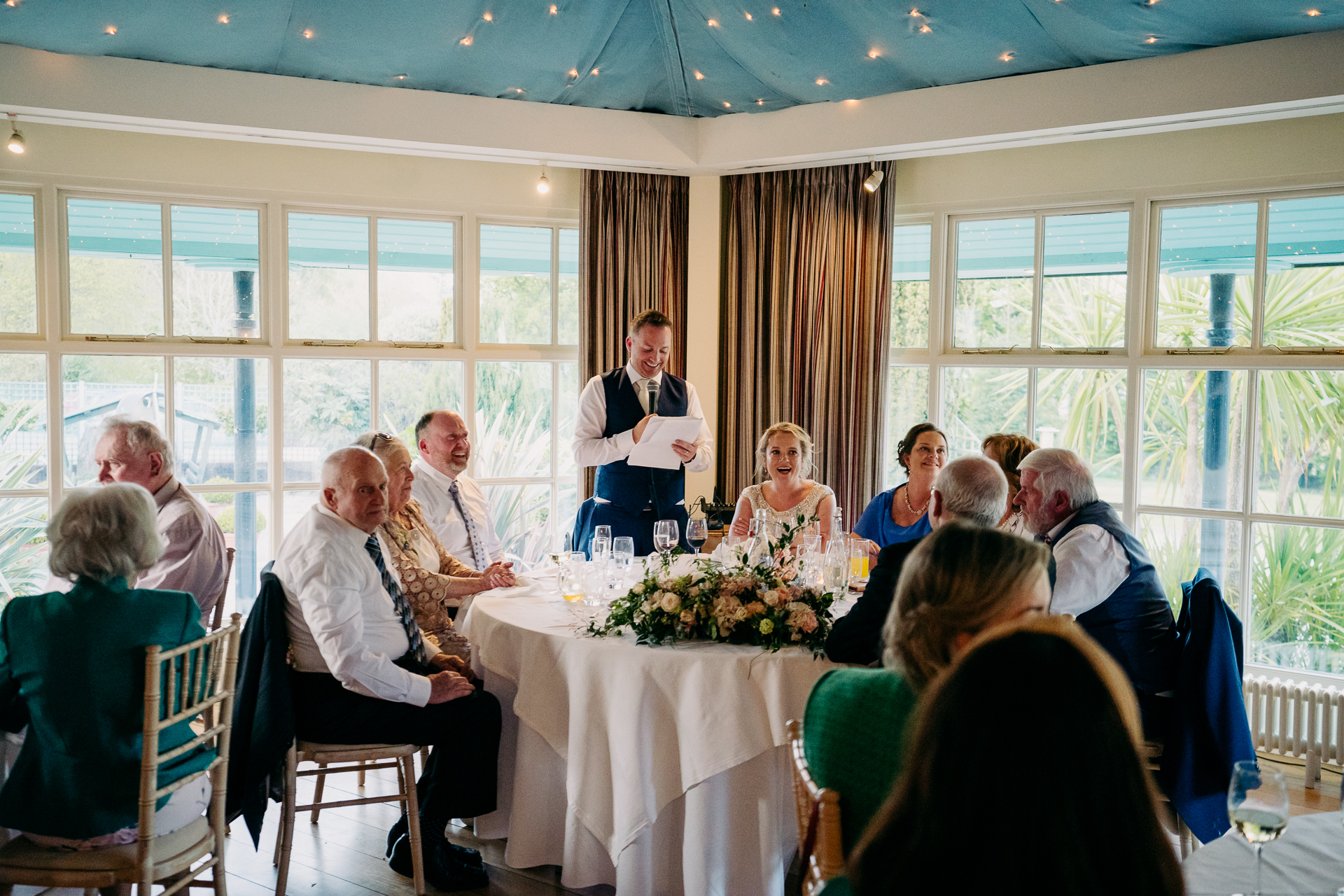 A group of people sitting around a table