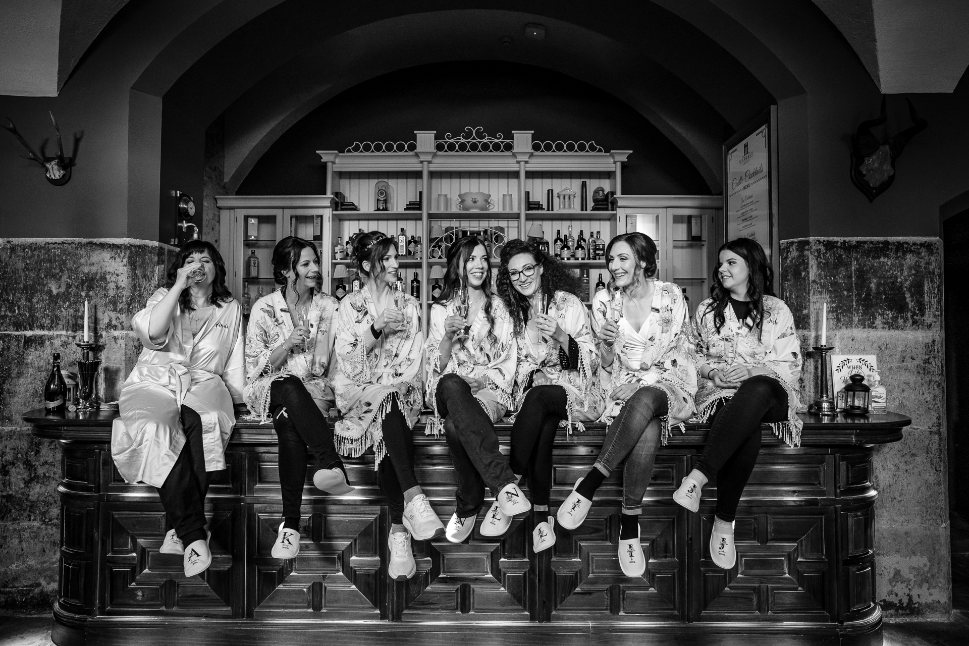 A group of women sitting on a bench