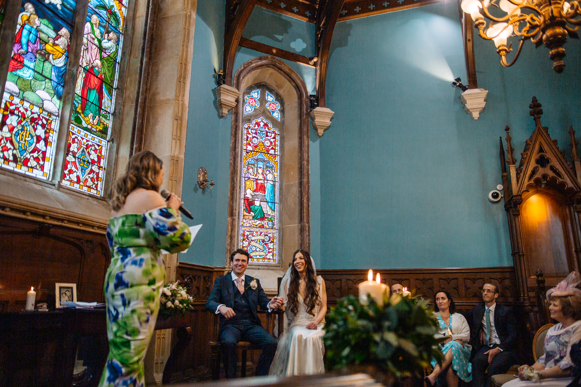 A woman in a white dress and a man in a suit in a church