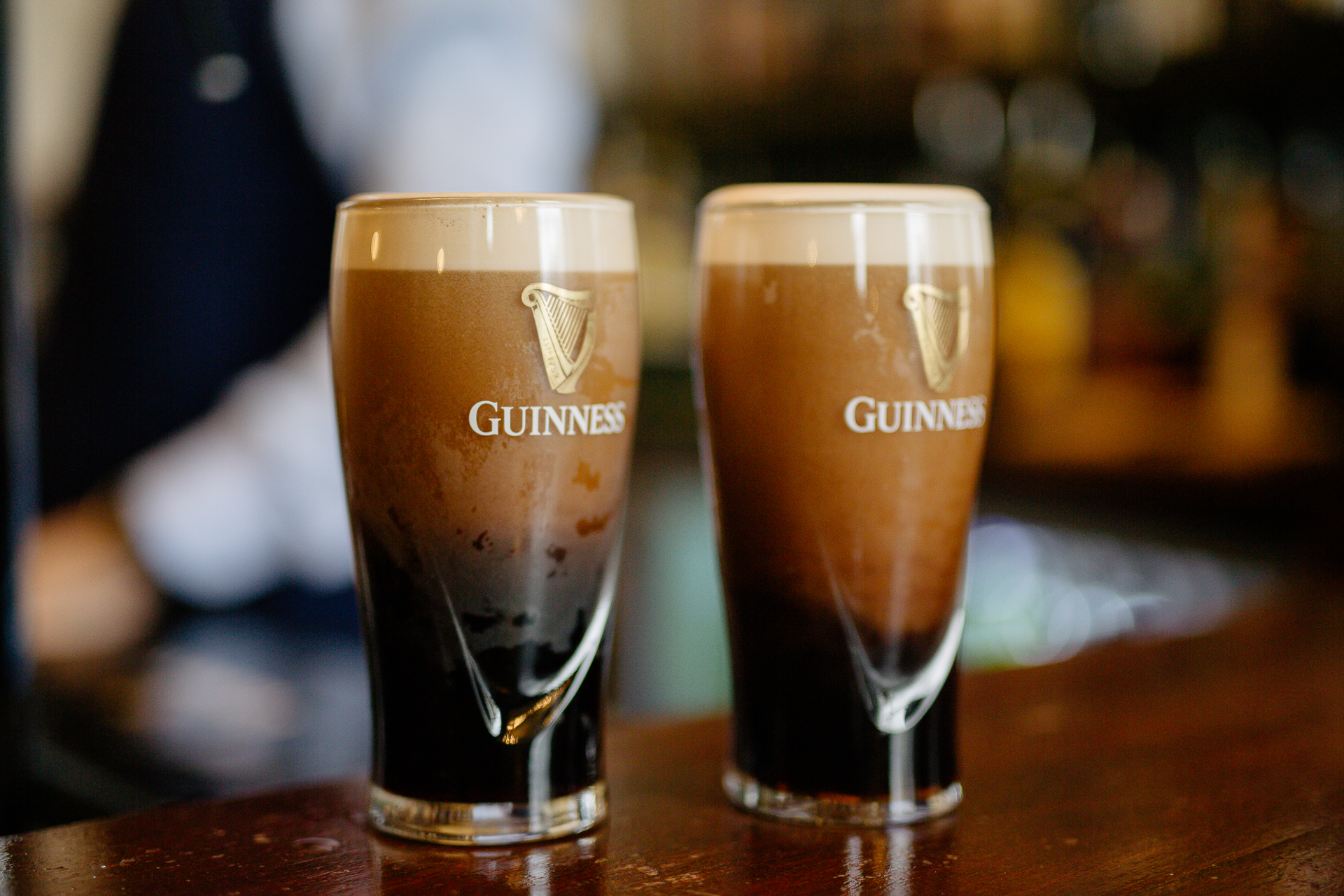 Two glasses of beer on a table