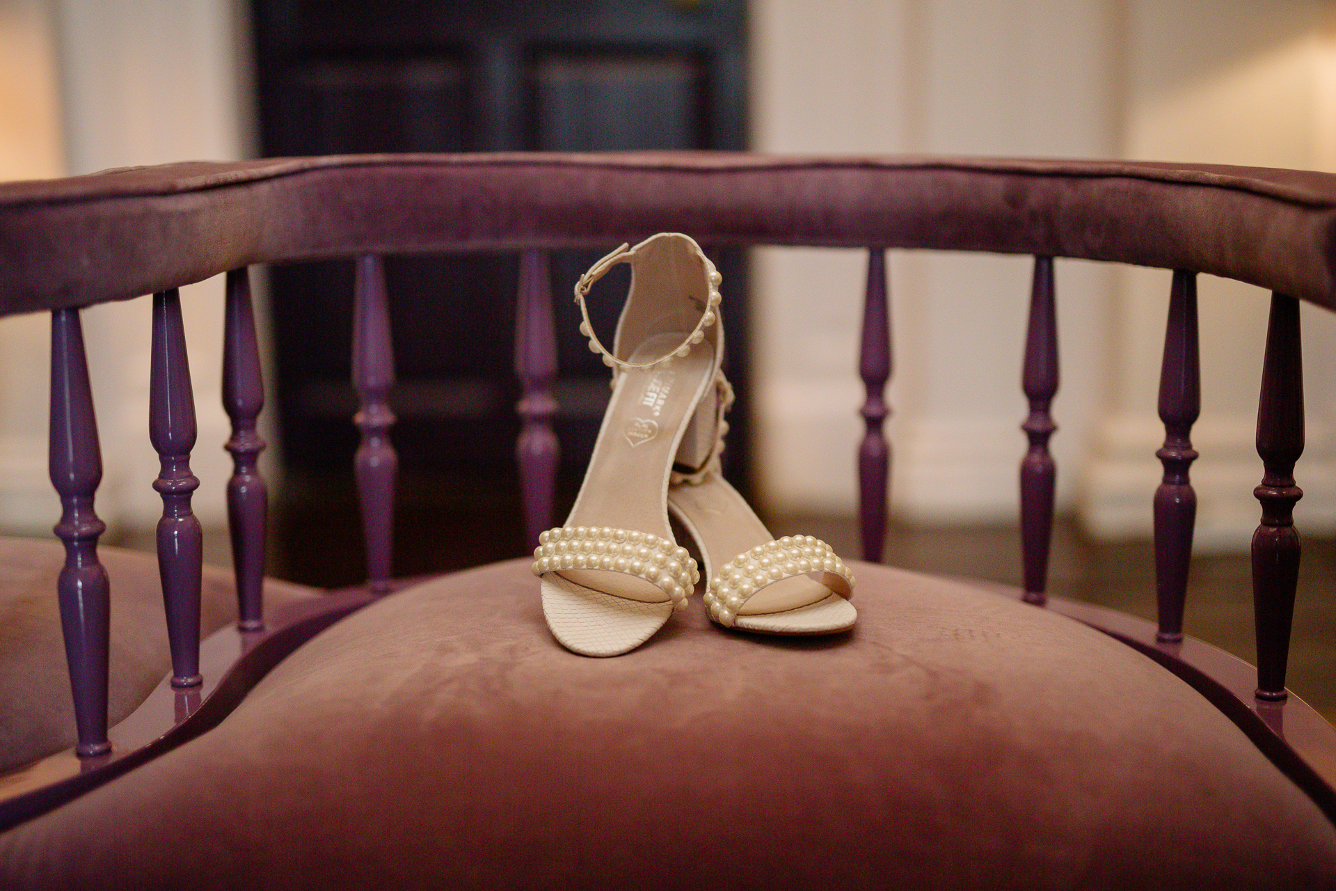 A pair of white shoes on a bench