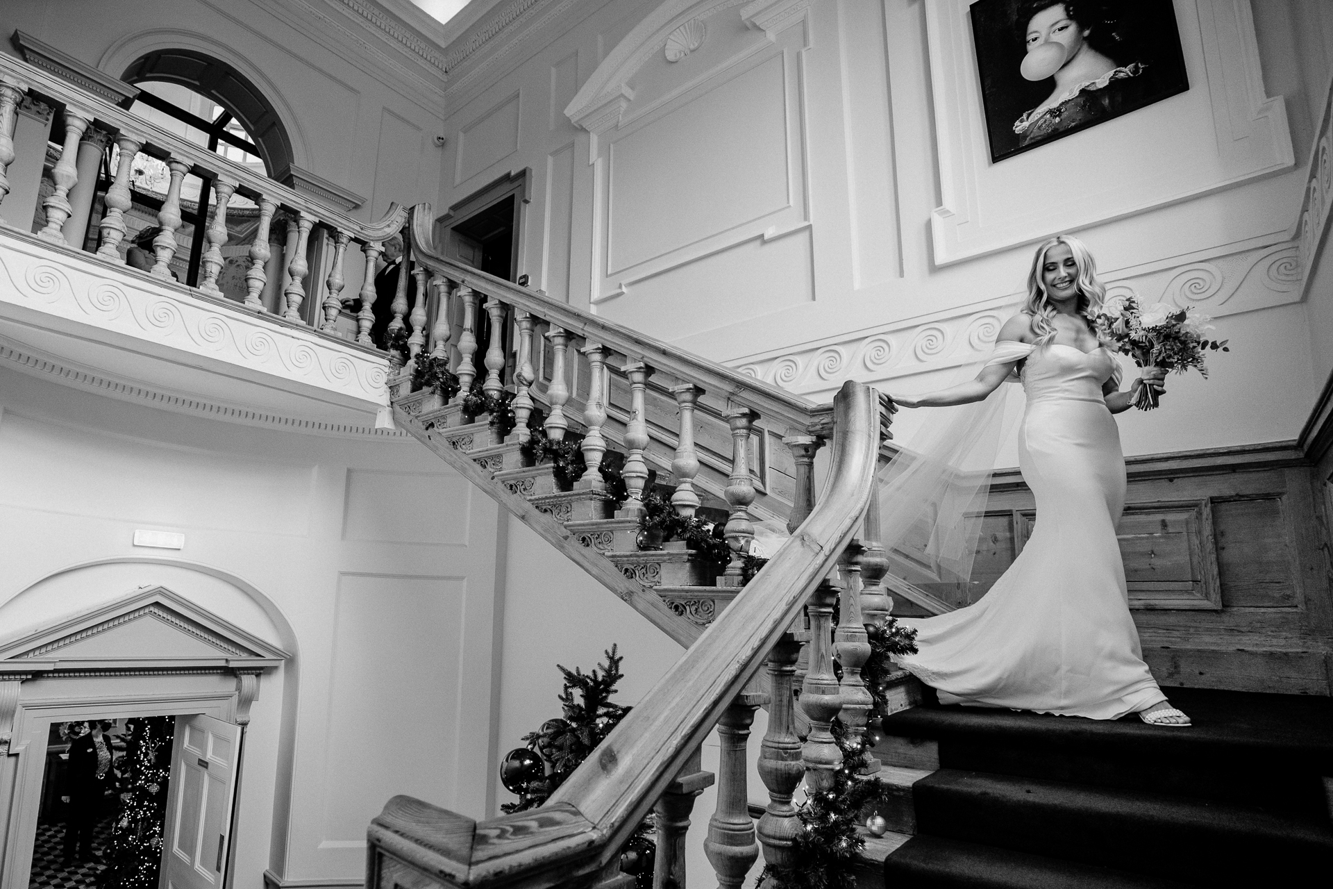 A person in a wedding dress on a staircase