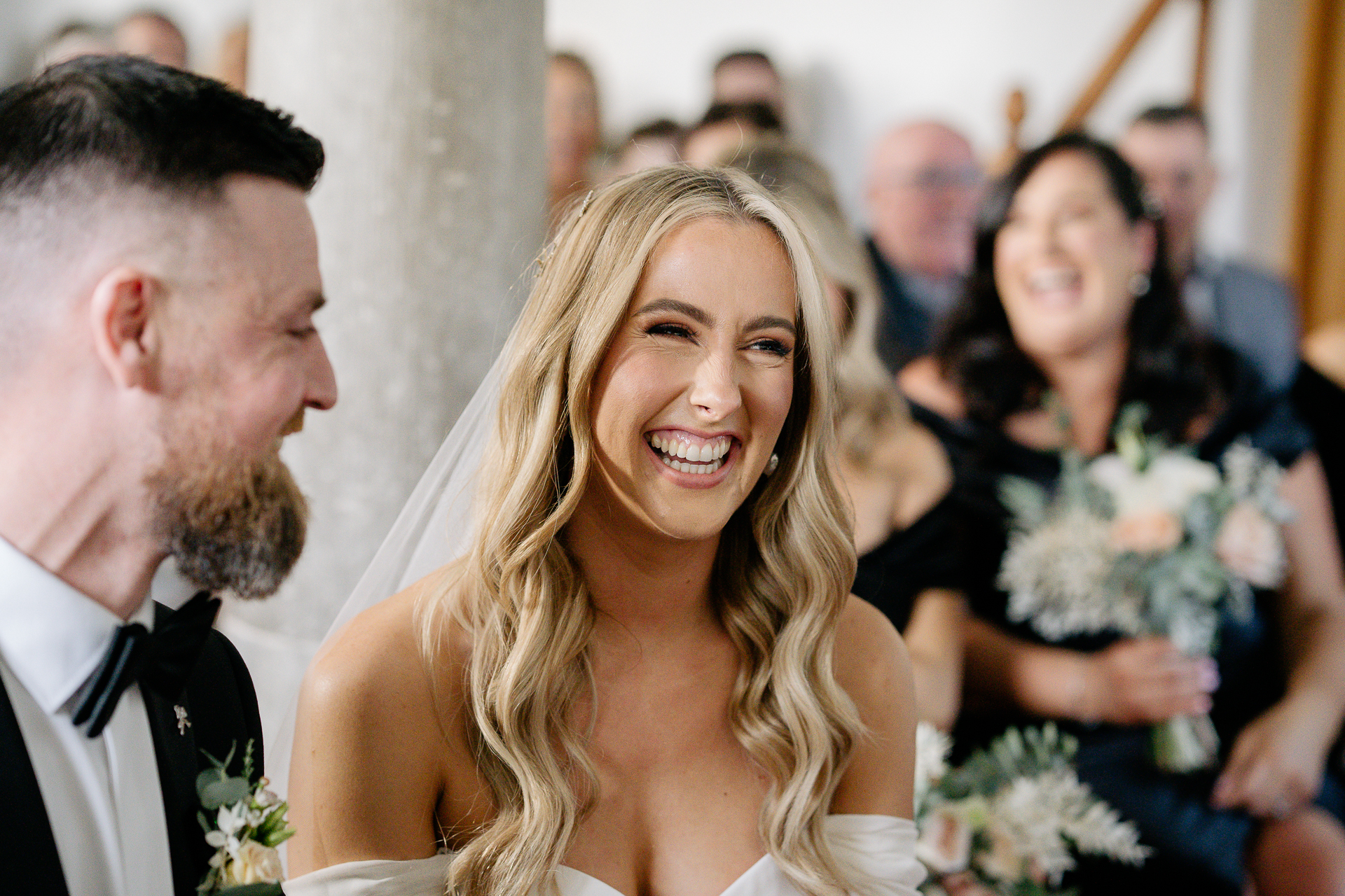 A man and woman smiling