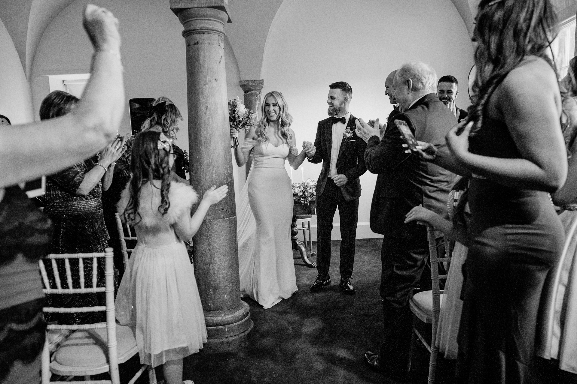 A bride and groom dancing