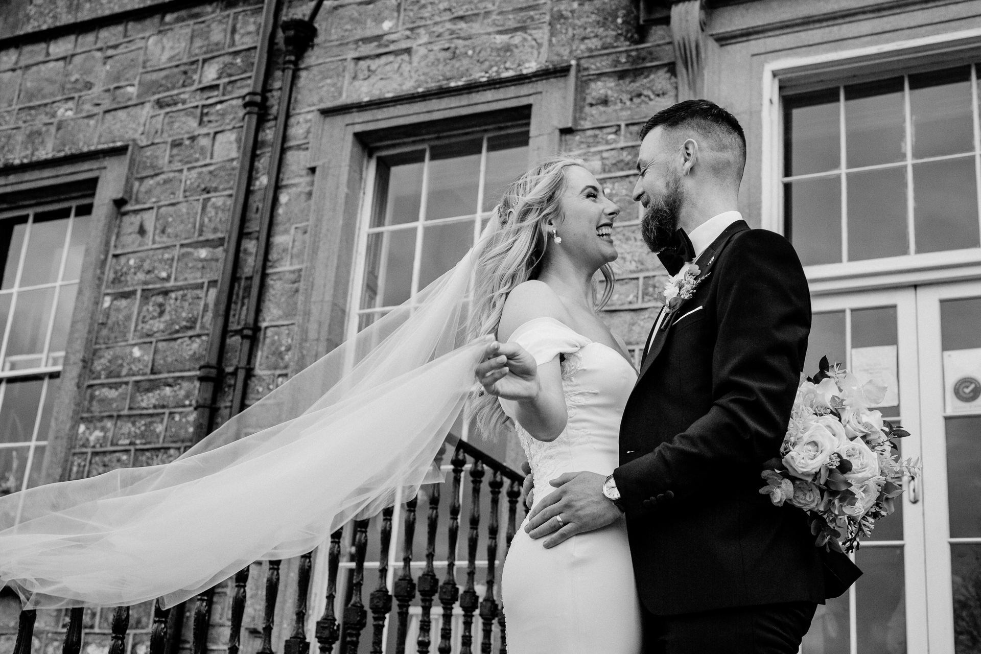 A bride and groom kissing