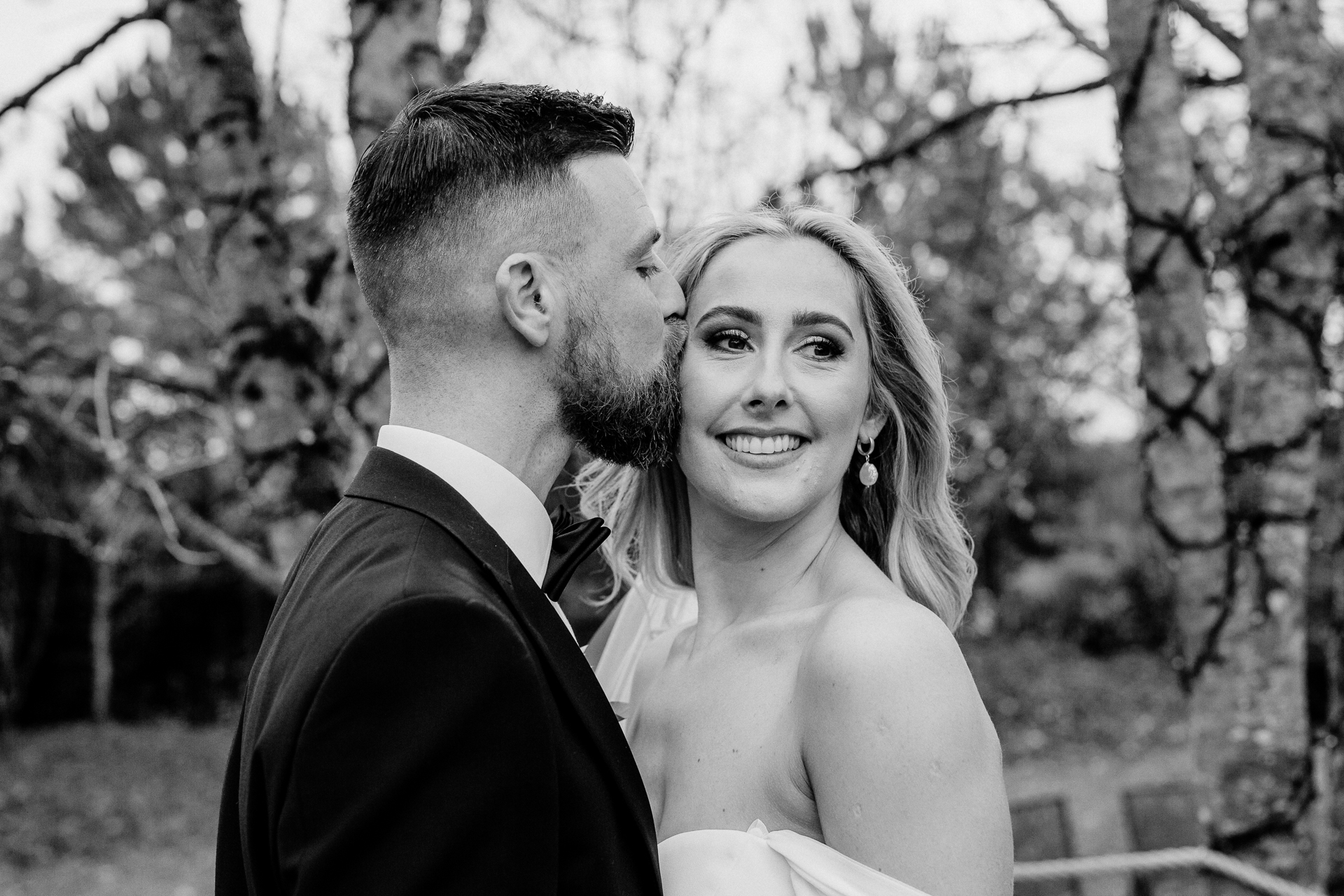 A man and woman posing for a picture