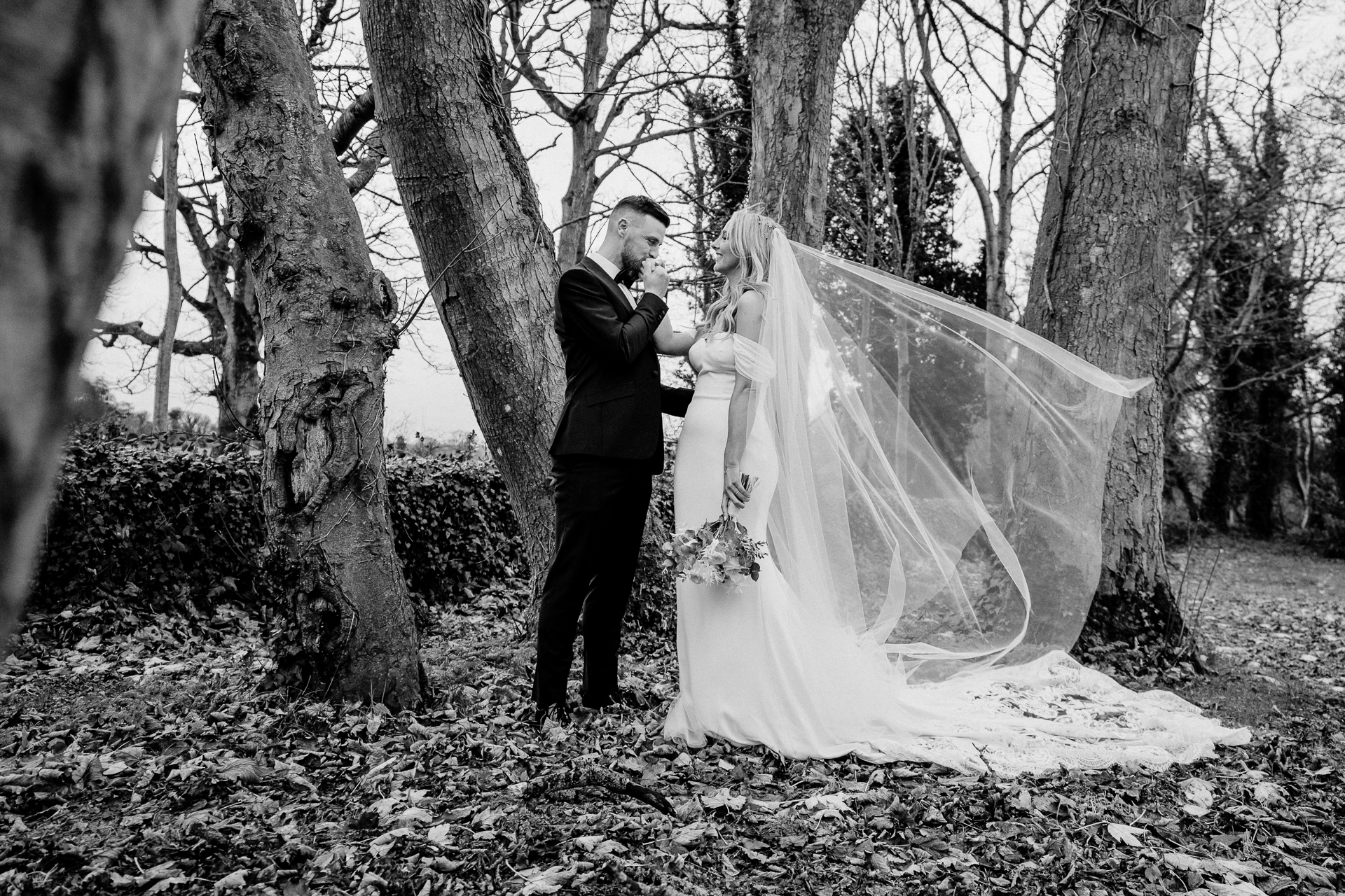 A bride and groom kissing