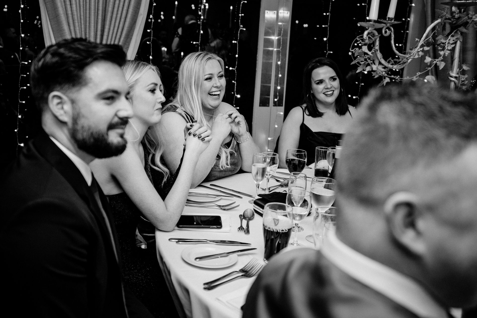 A group of people sitting around a table