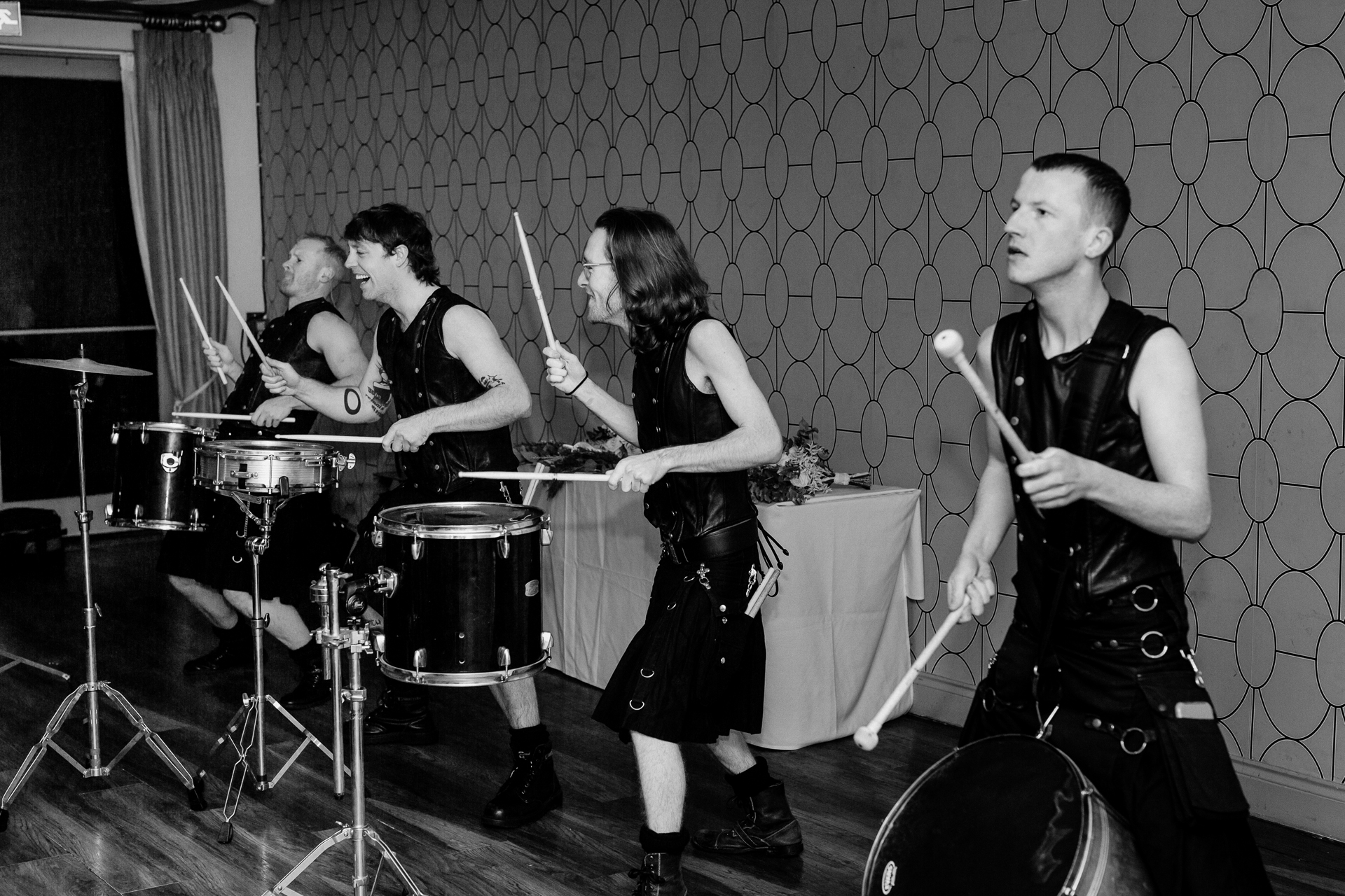 A group of people playing drums