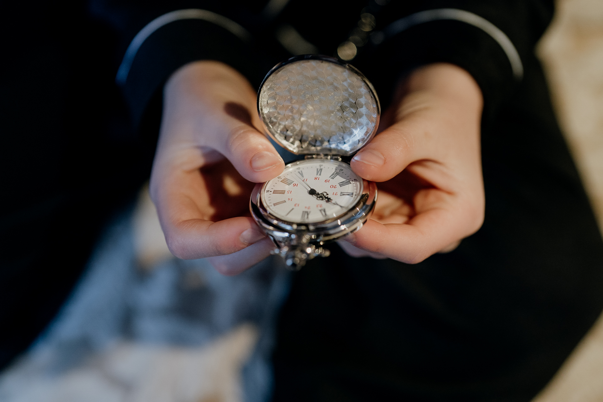 A person holding a watch