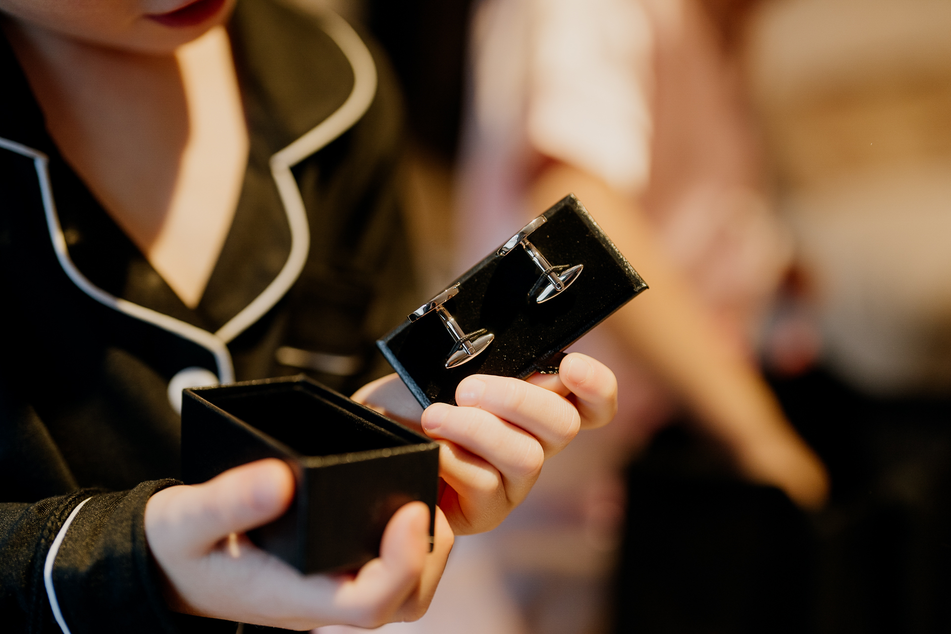 A woman holding a couple of cell phones