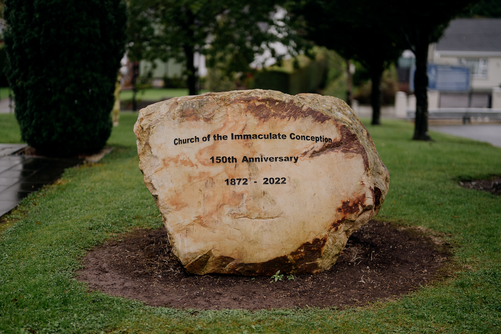 A stone with writing on it