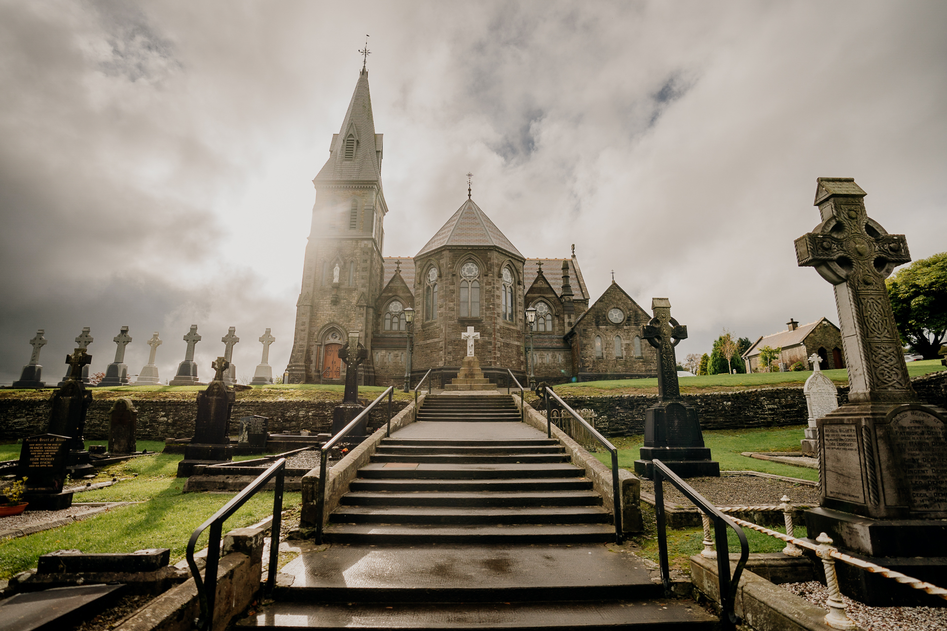 A cemetery with a church in the background